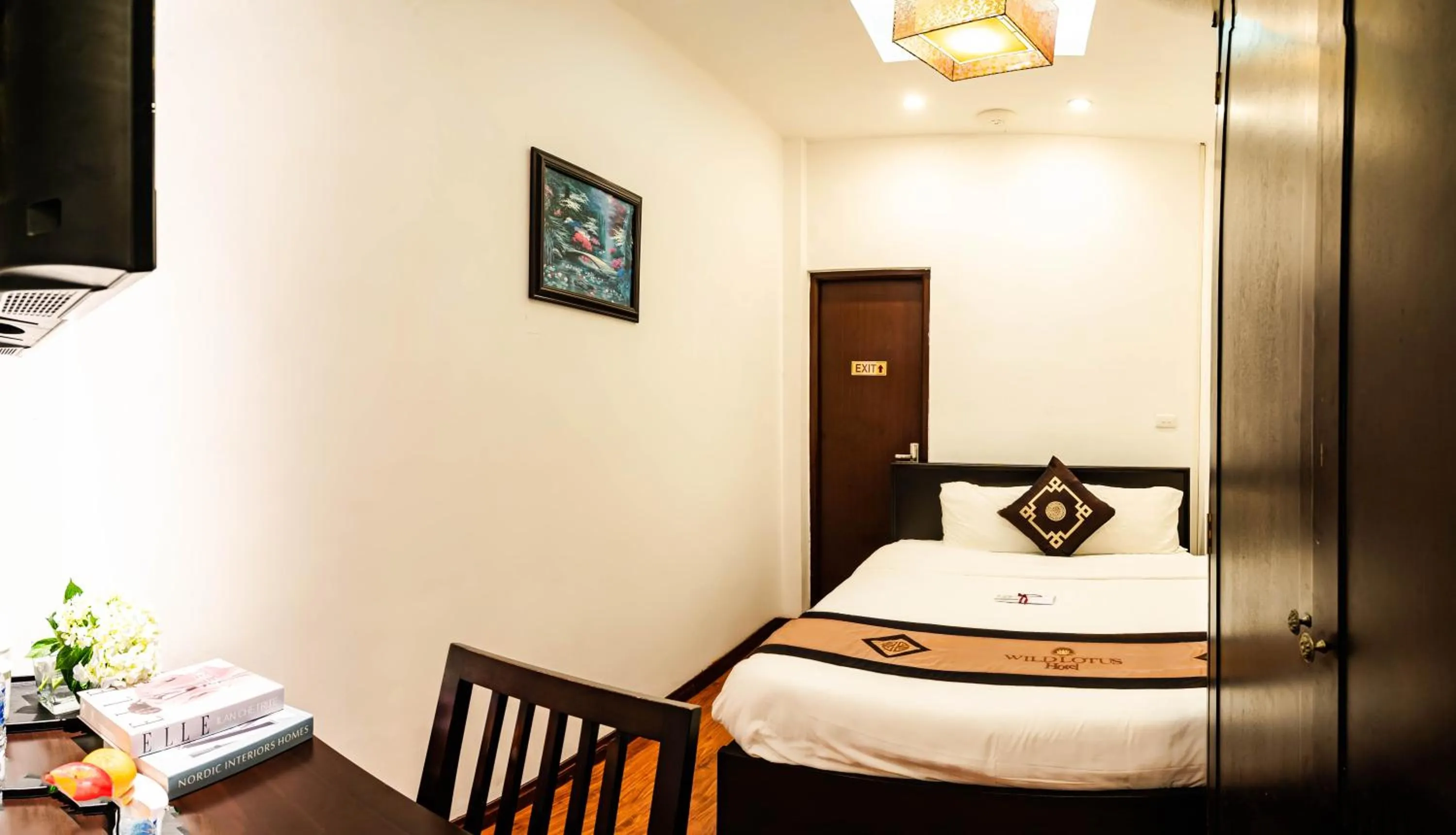 Bed in Wild Lotus Hotel & Travel 2