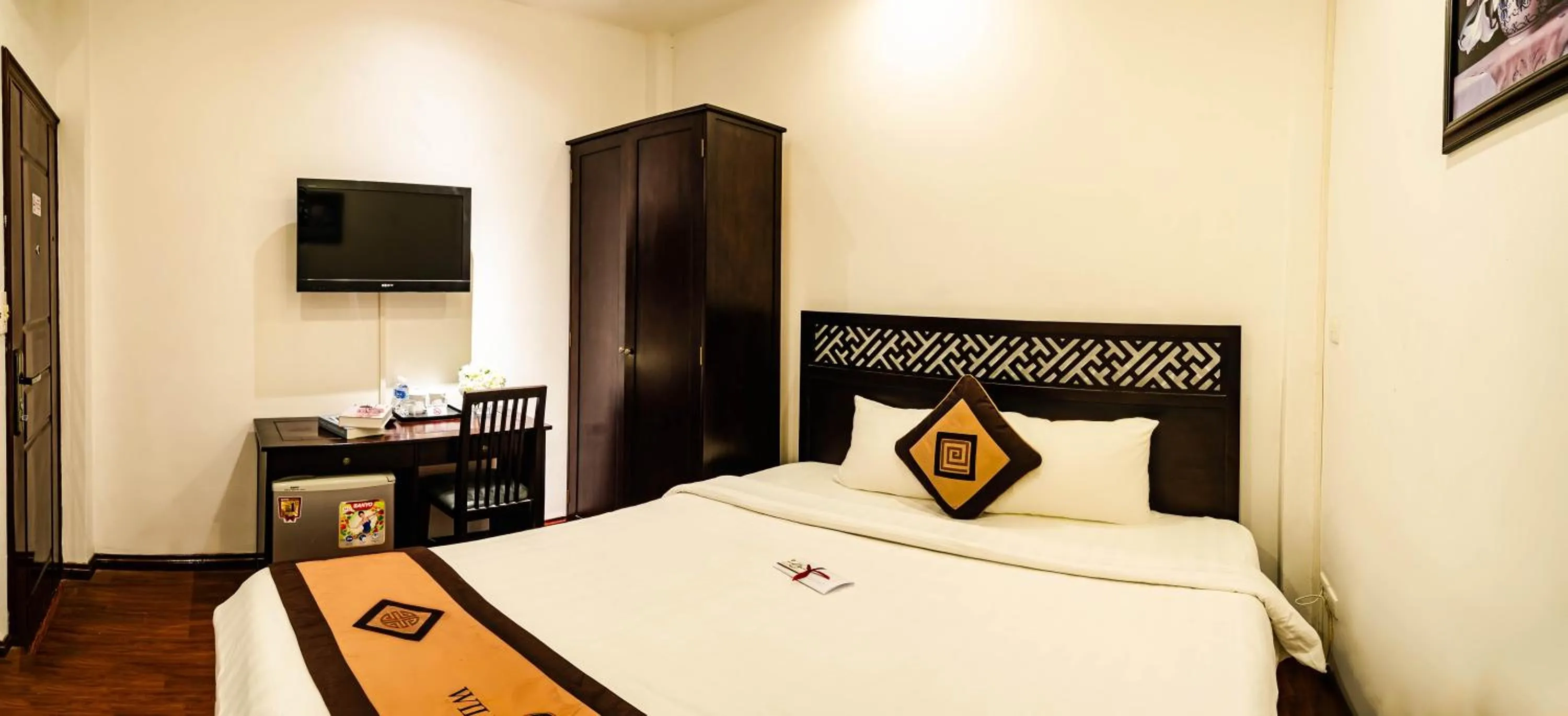 Bed in Wild Lotus Hotel & Travel 2