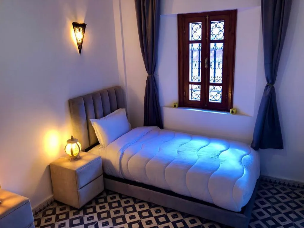 Bed in Riad Amely