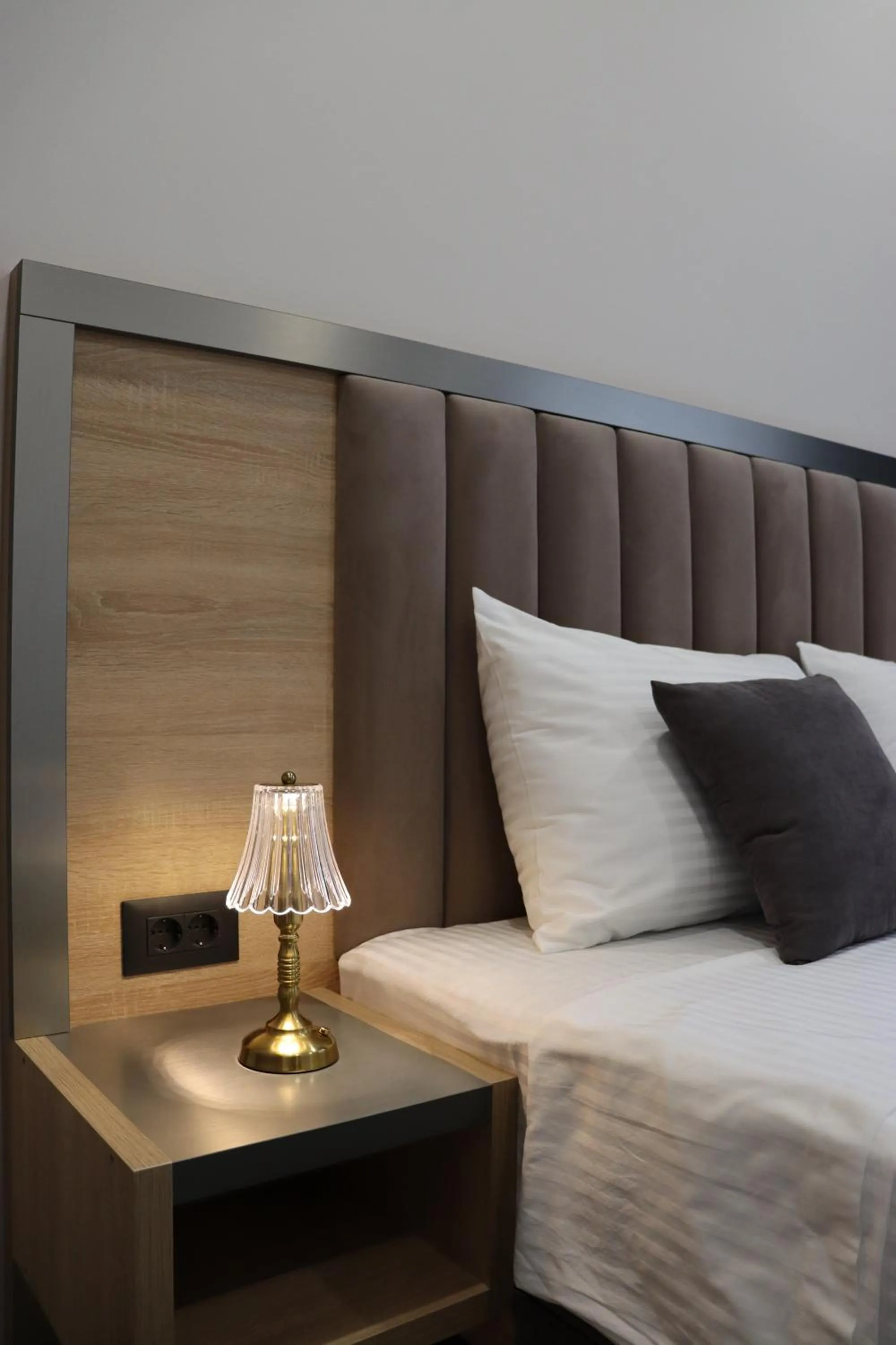 Bed in Orion ApartHotel