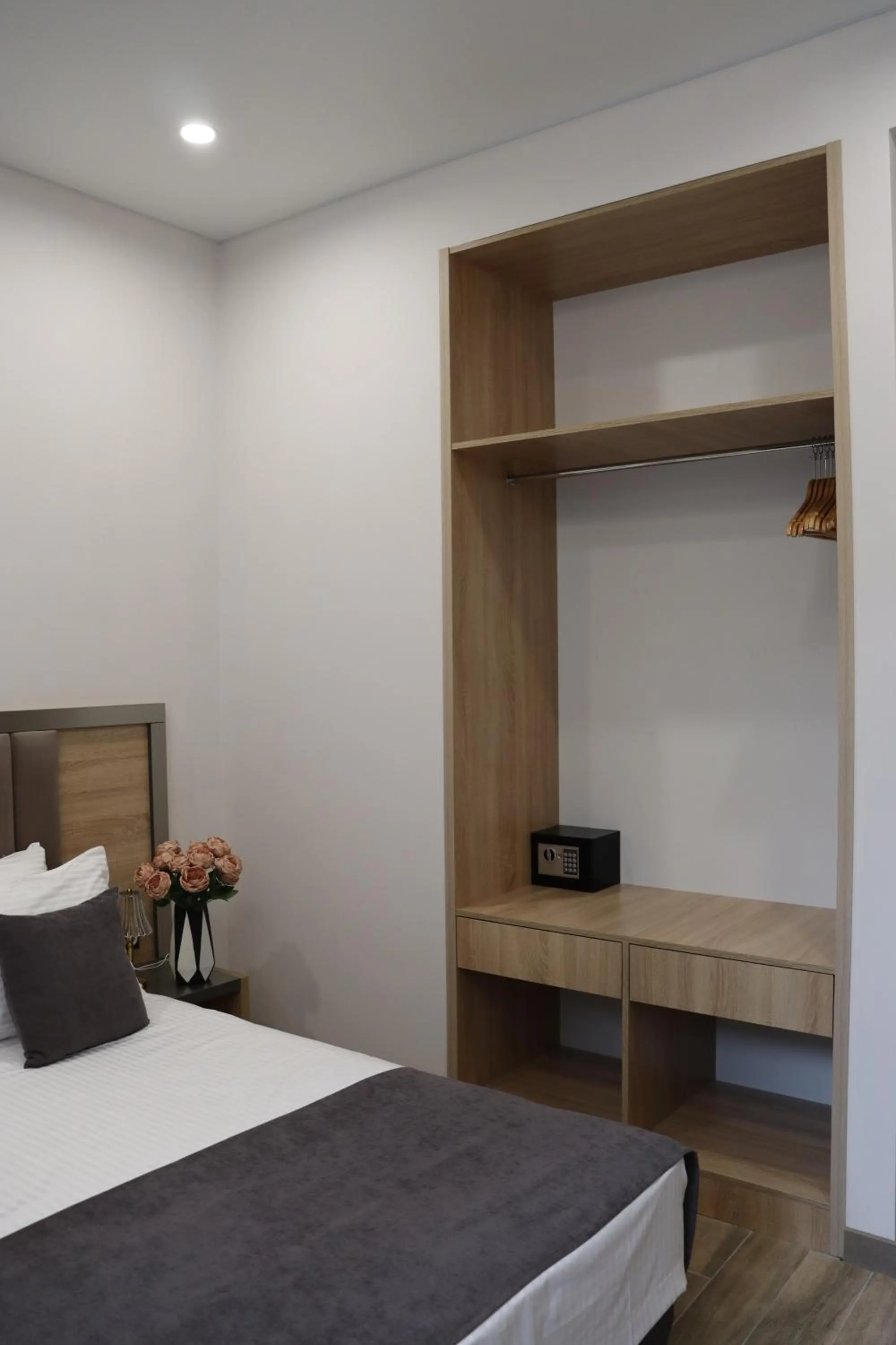 Bed in Orion ApartHotel