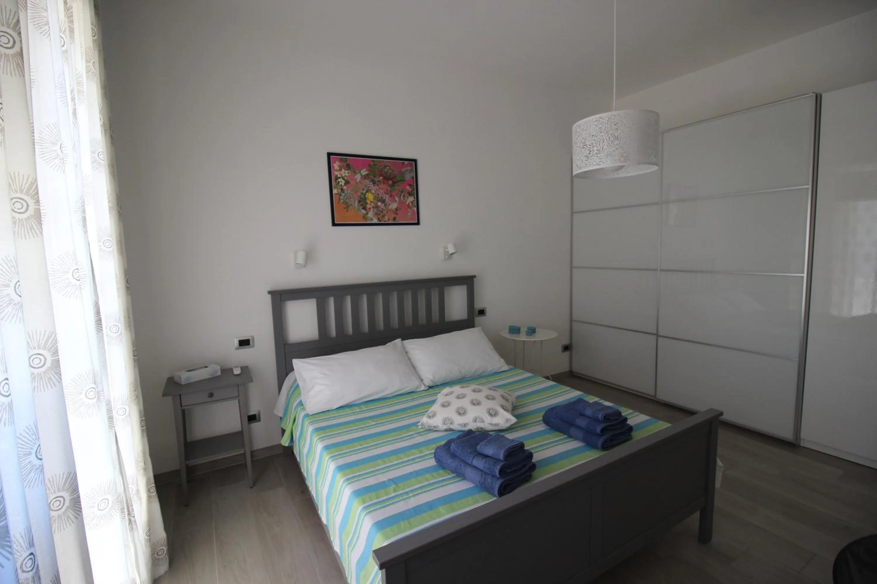 Bedroom, Bed in Appartamento Lungomare Toscanelli