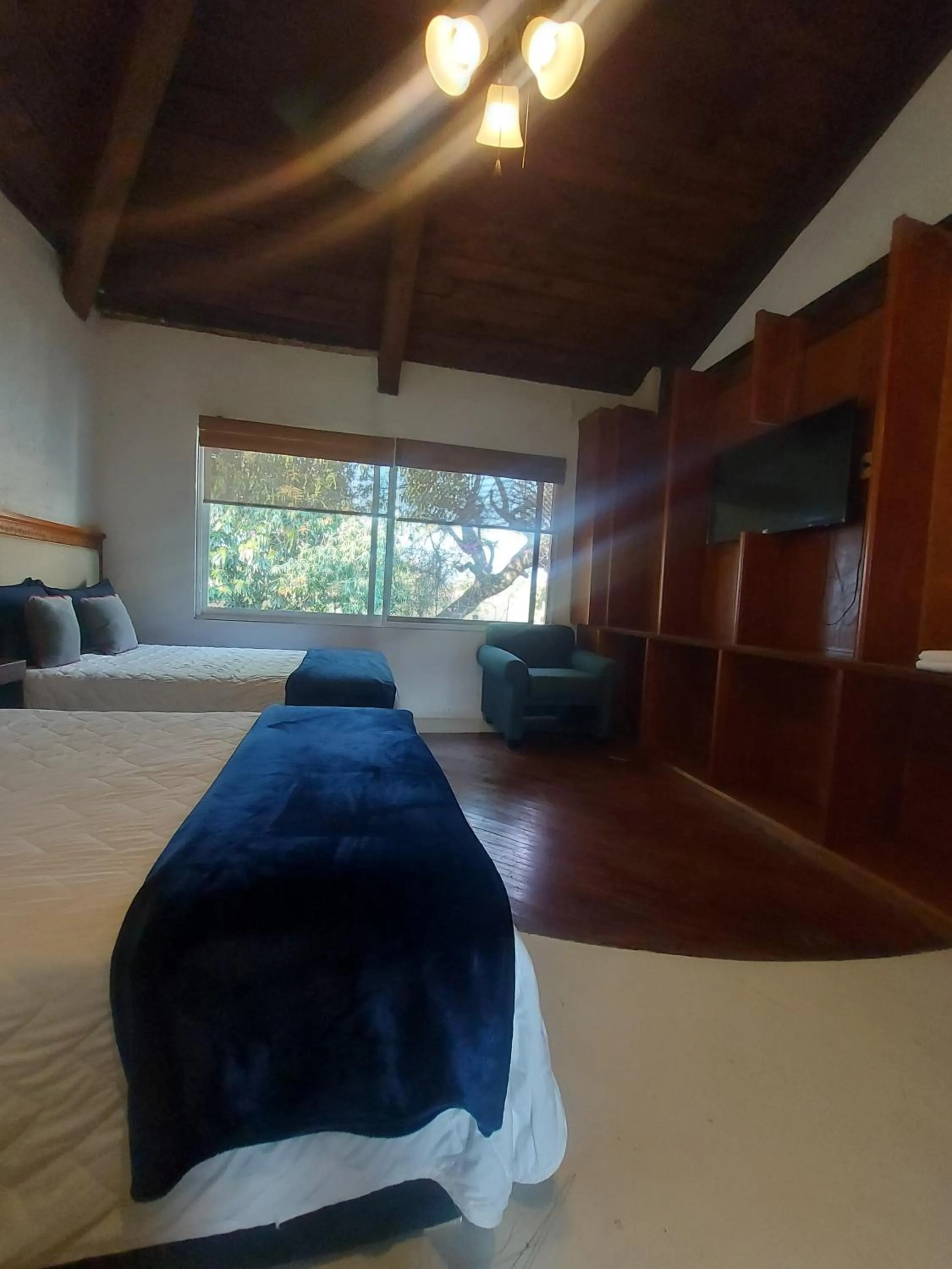Photo of the whole room, Bed in Casa De La O Yautepec