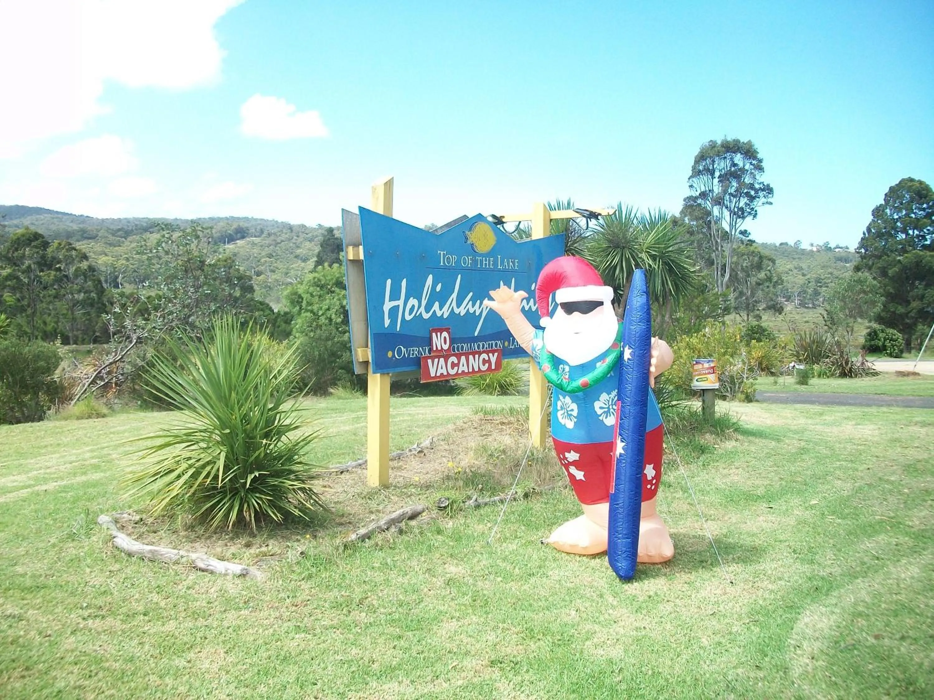 Property logo or sign in Top of the Lake Holiday Units