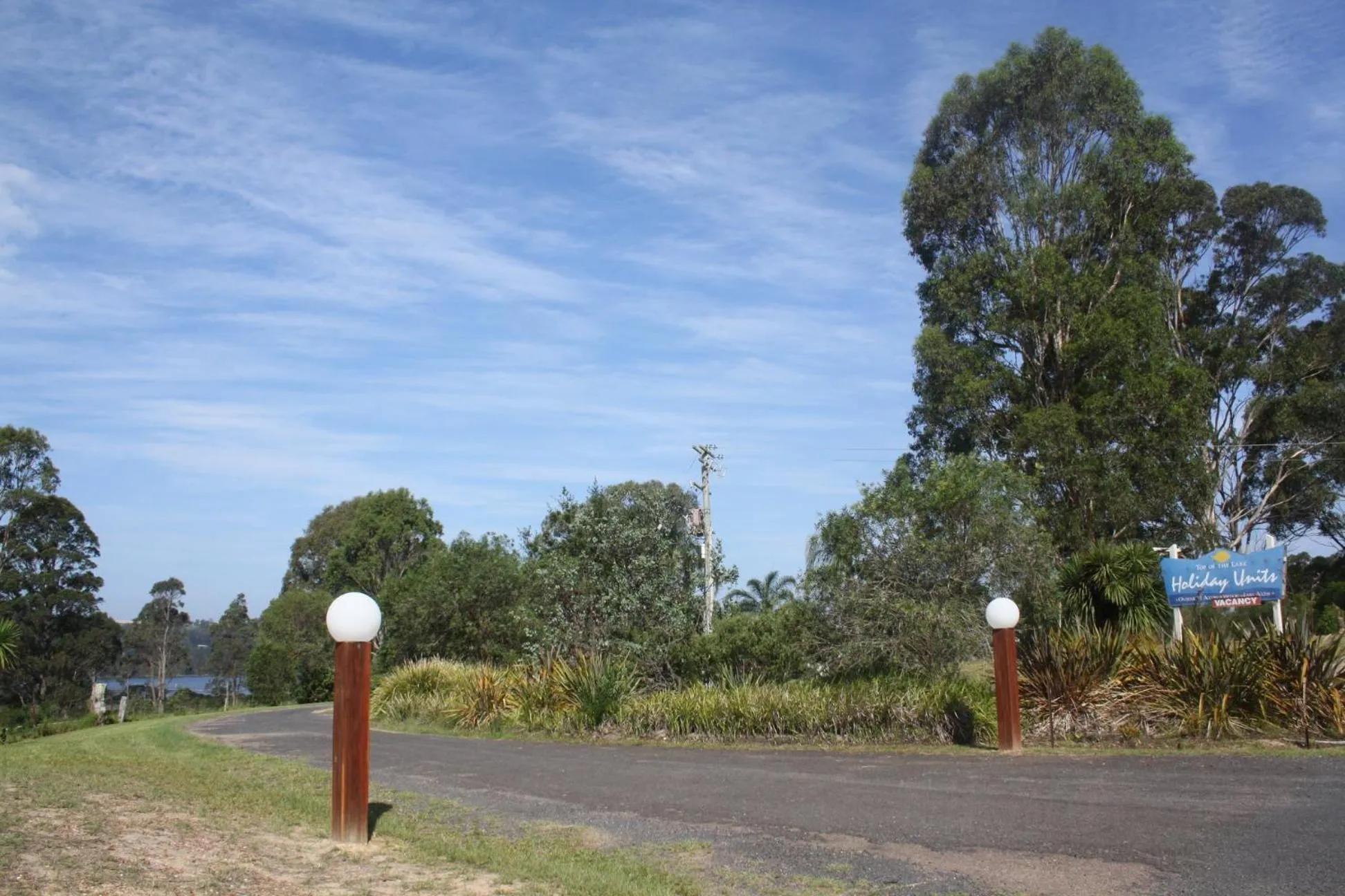 Property logo or sign in Top of the Lake Holiday Units