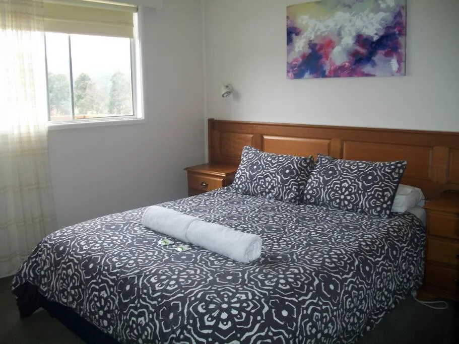 Bed in Top of the Lake Holiday Units