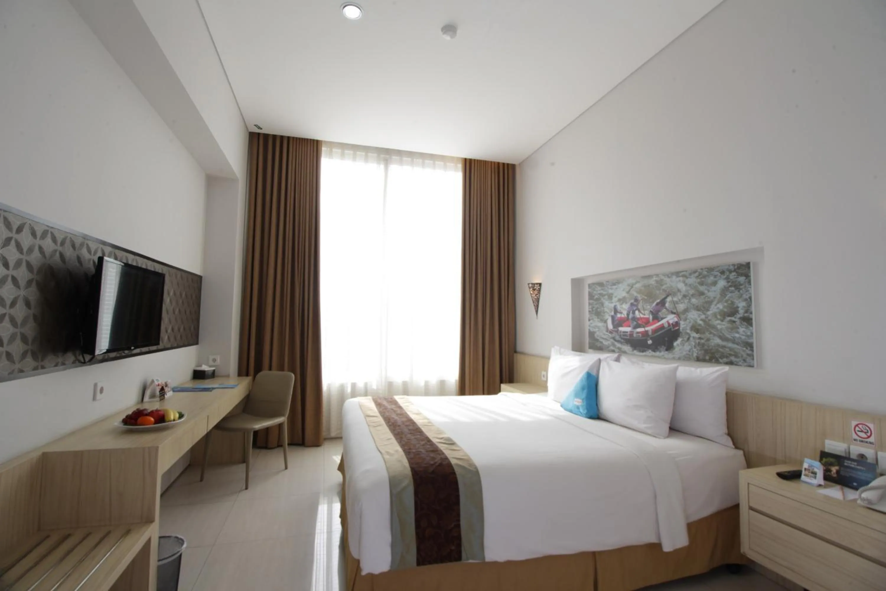 TV and multimedia, TV/Entertainment Center in Megaland Hotel Solo