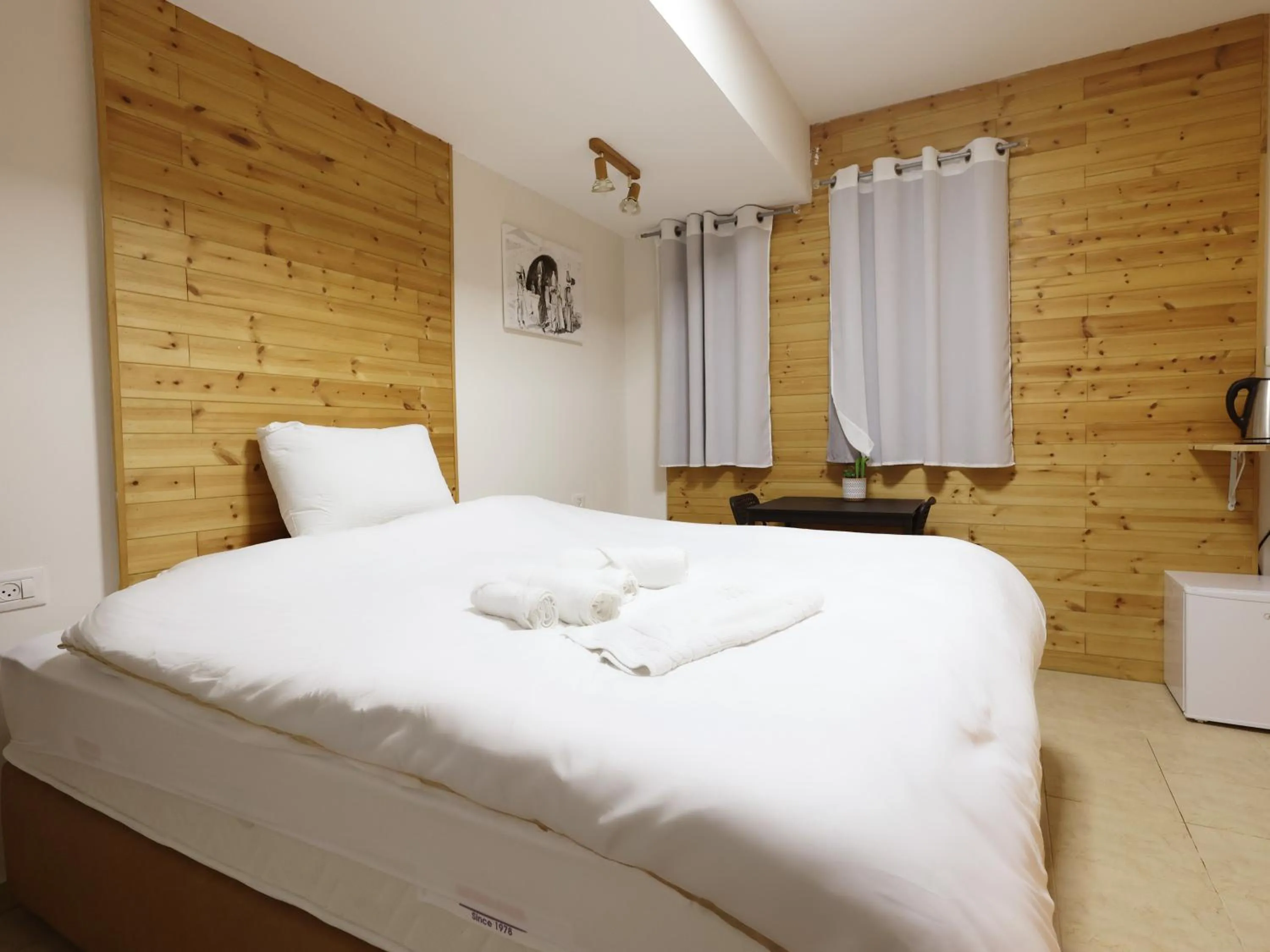 Bed in Mary's Well Apartments