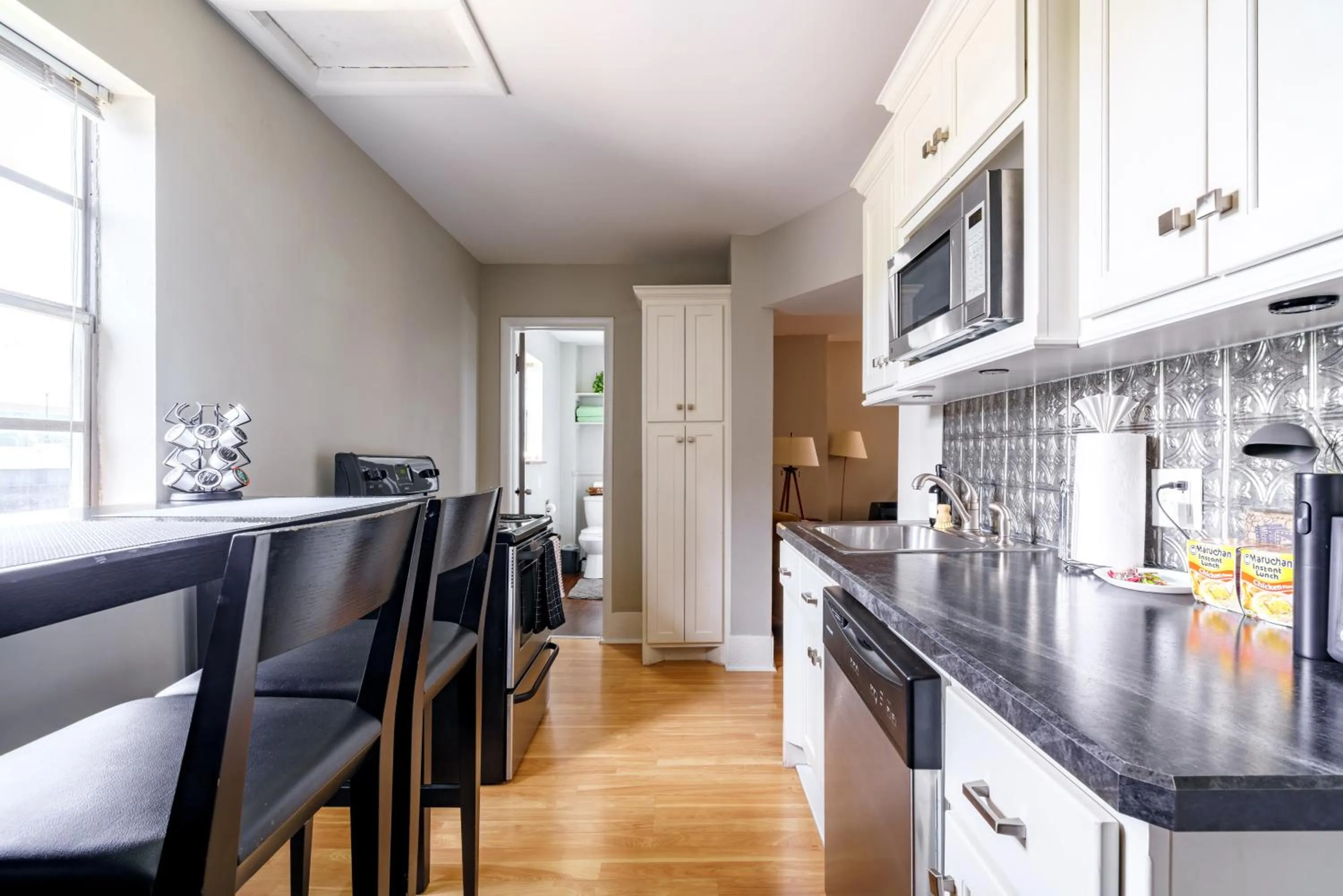 Kitchen or kitchenette in Jungle House Modern Lofts - Arena District & Short North