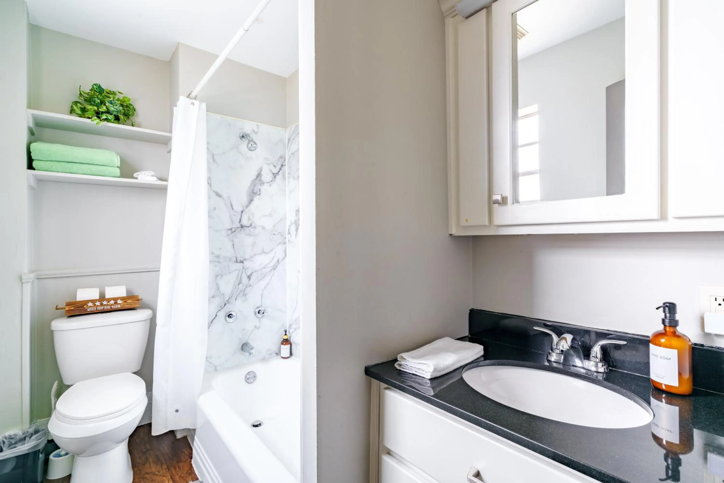 Toilet in Jungle House Modern Lofts - Arena District & Short North