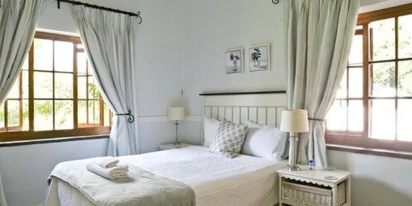 Bed in Grace Guest House