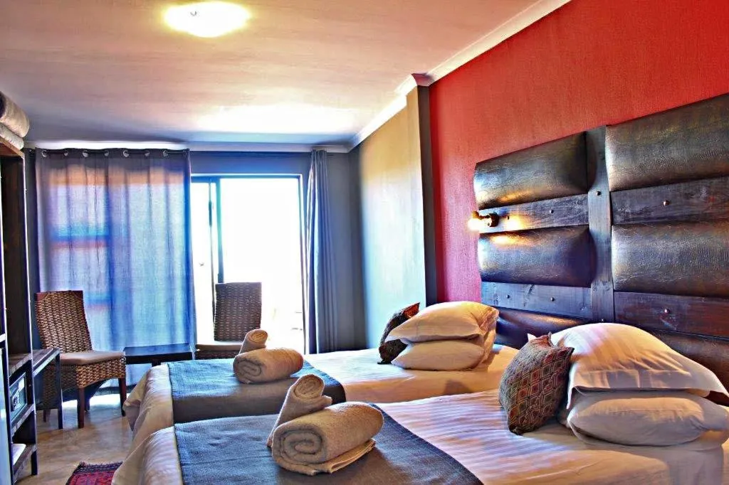 Photo of the whole room, Bed in Opuwo Country Lodge