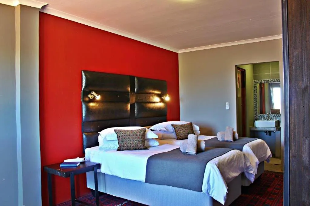 Photo of the whole room, Bed in Opuwo Country Lodge