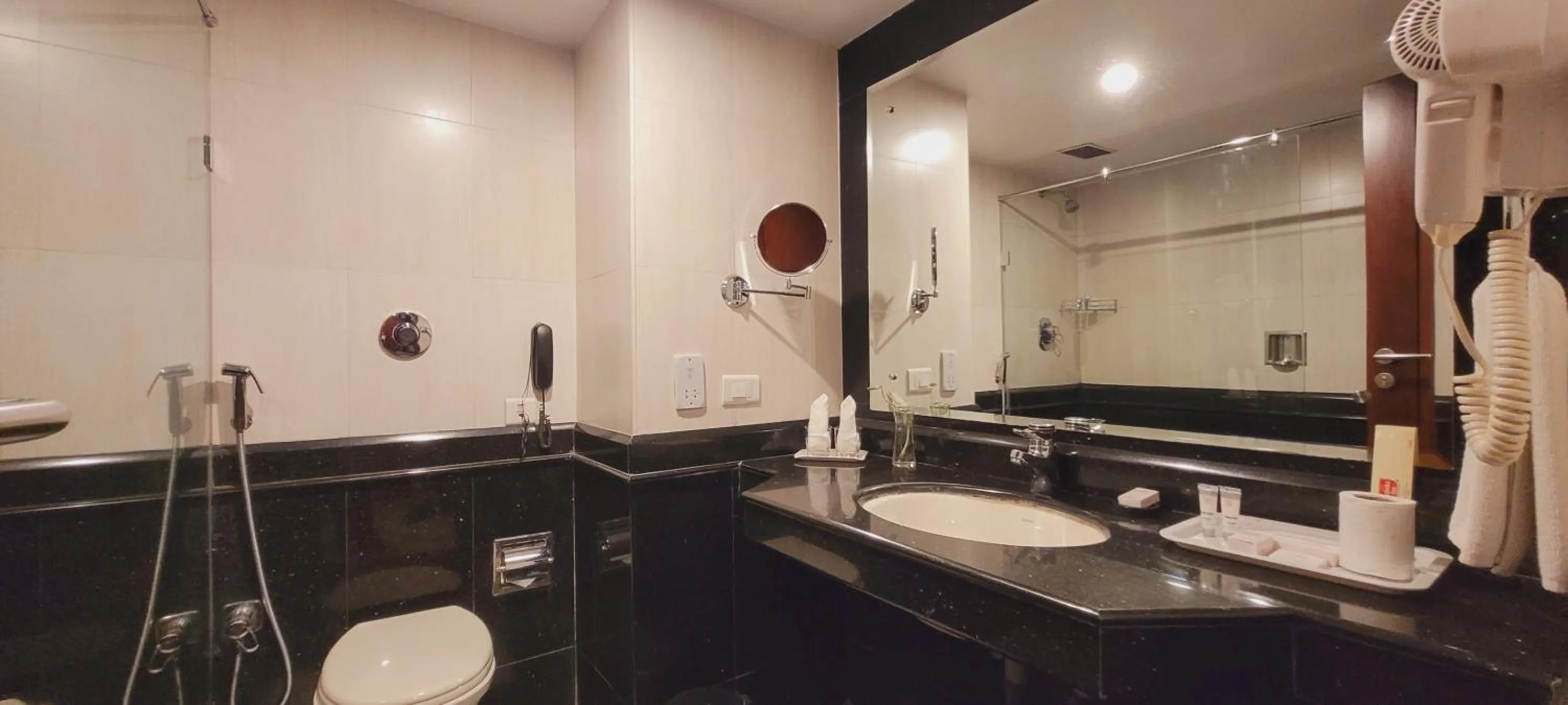 Bathroom in ASHOKA INN