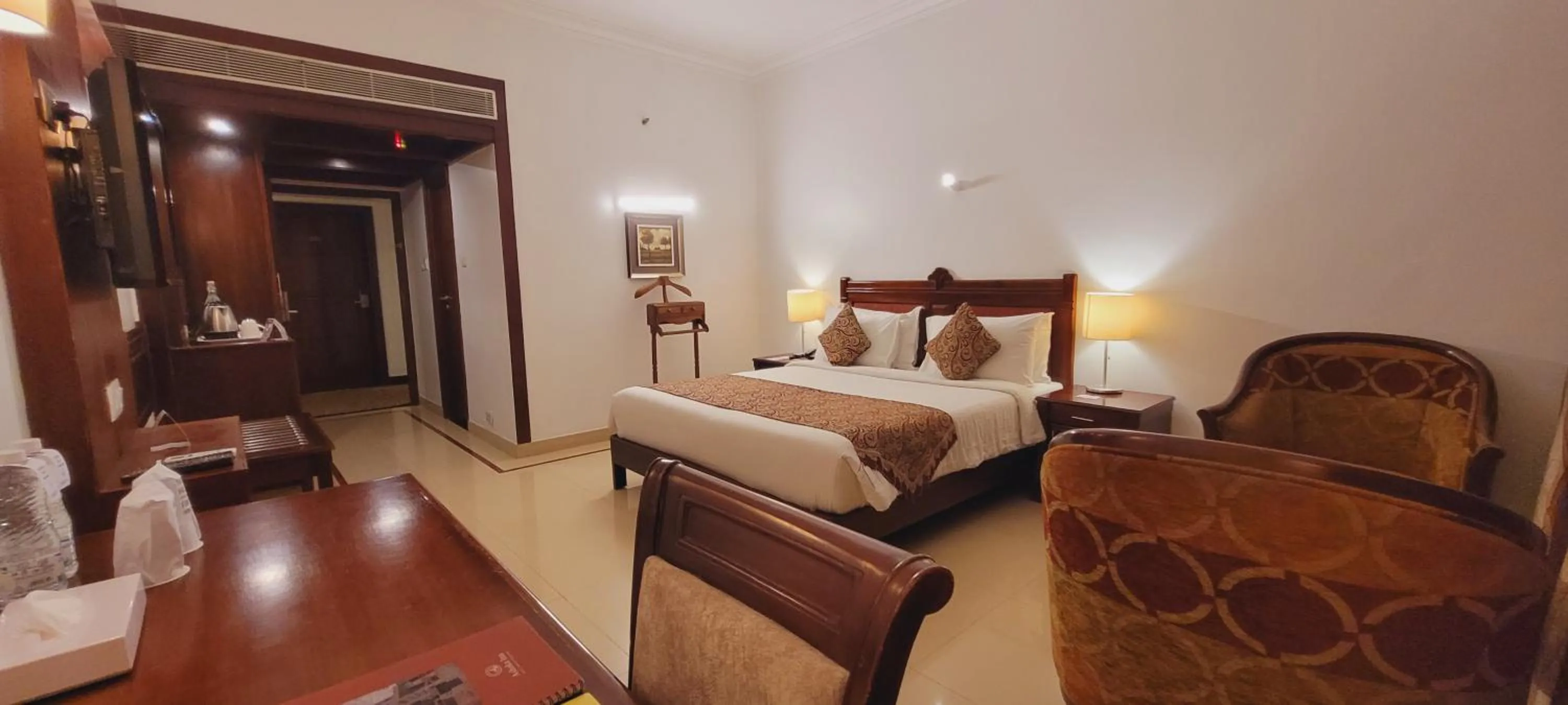 Photo of the whole room, Bed in ASHOKA INN