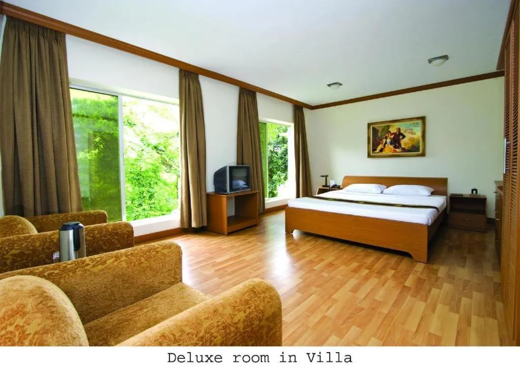 Bed in Nazimgarh Garden Resort