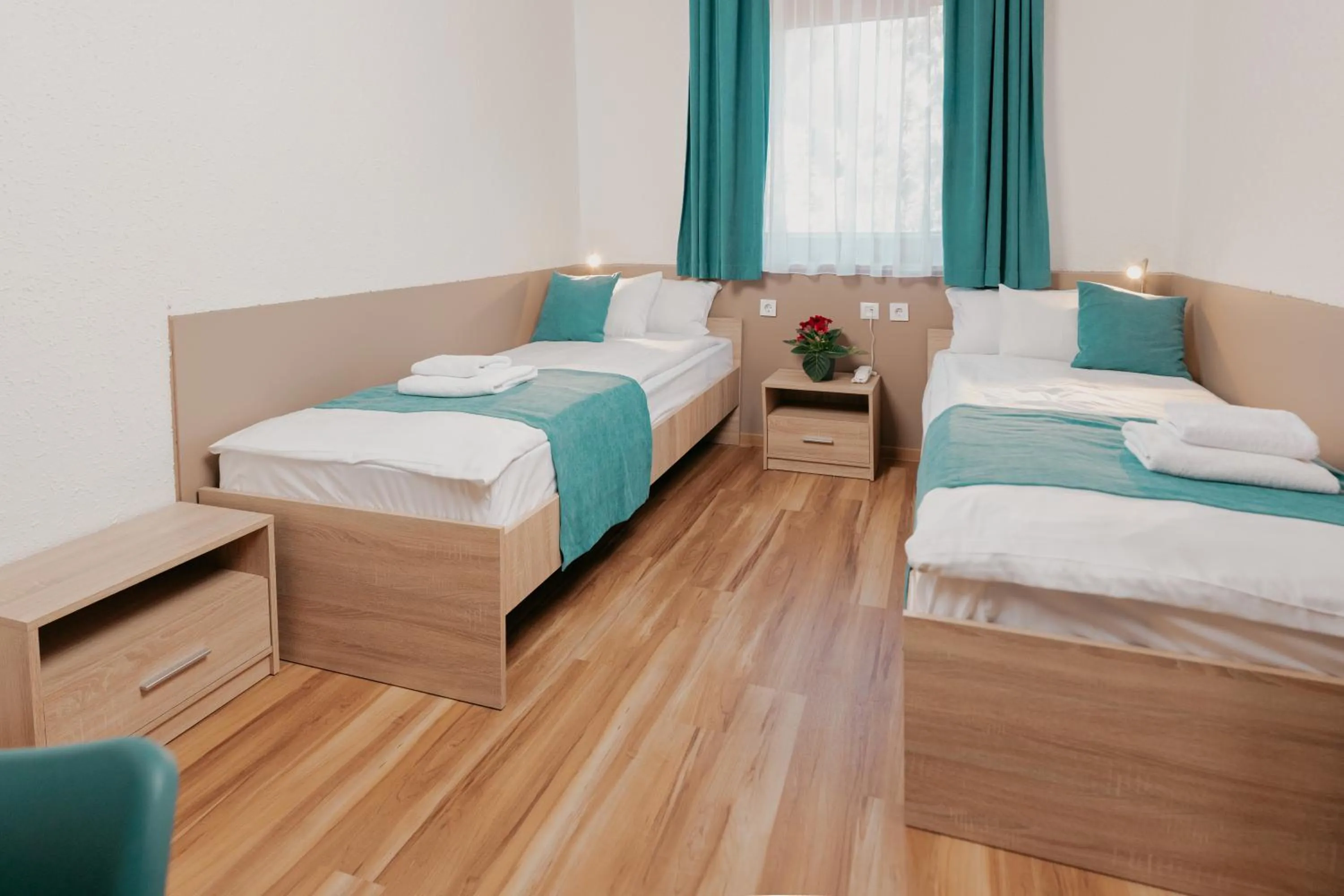 Bed in Homoky Hotels Bestline Hotel