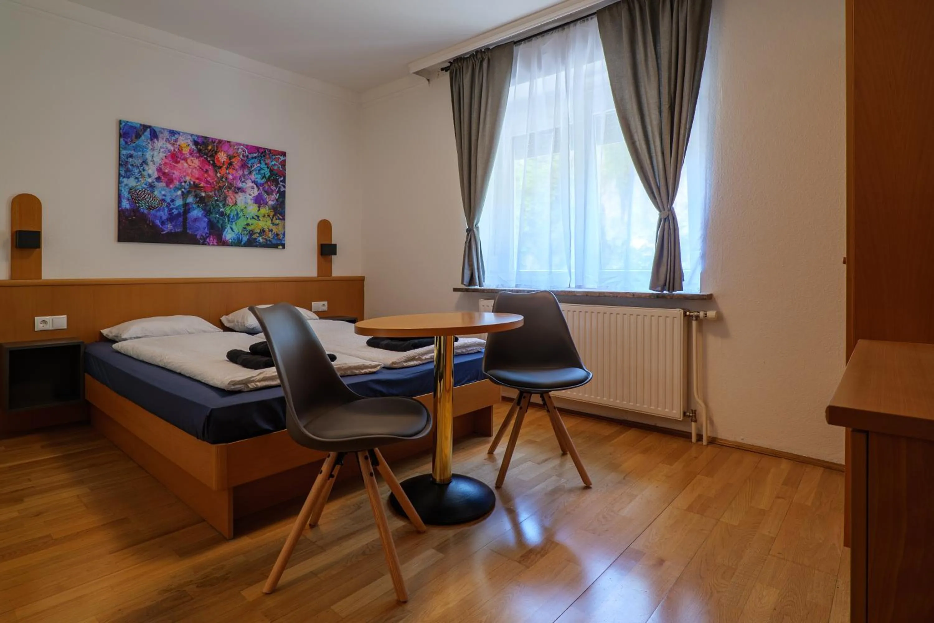 Bed in Flataid Gästehaus Graschi - Steinbergstraße