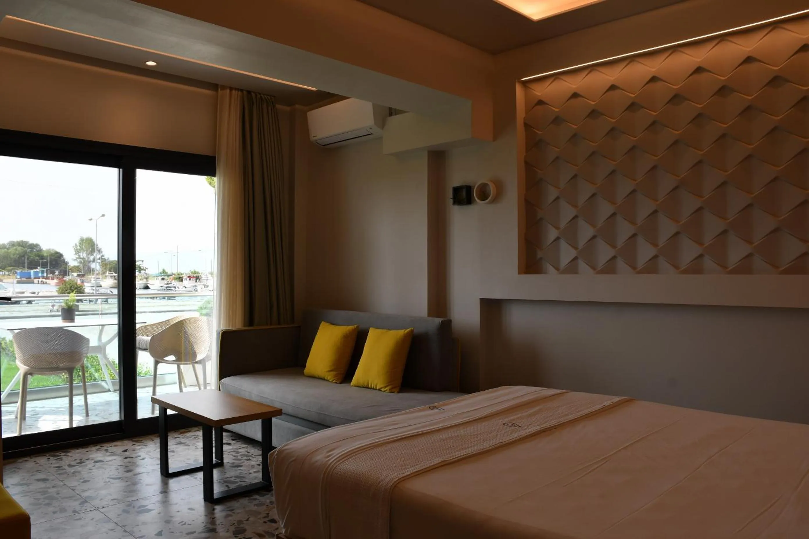 Bed in NERO SEASCAPE SUITES