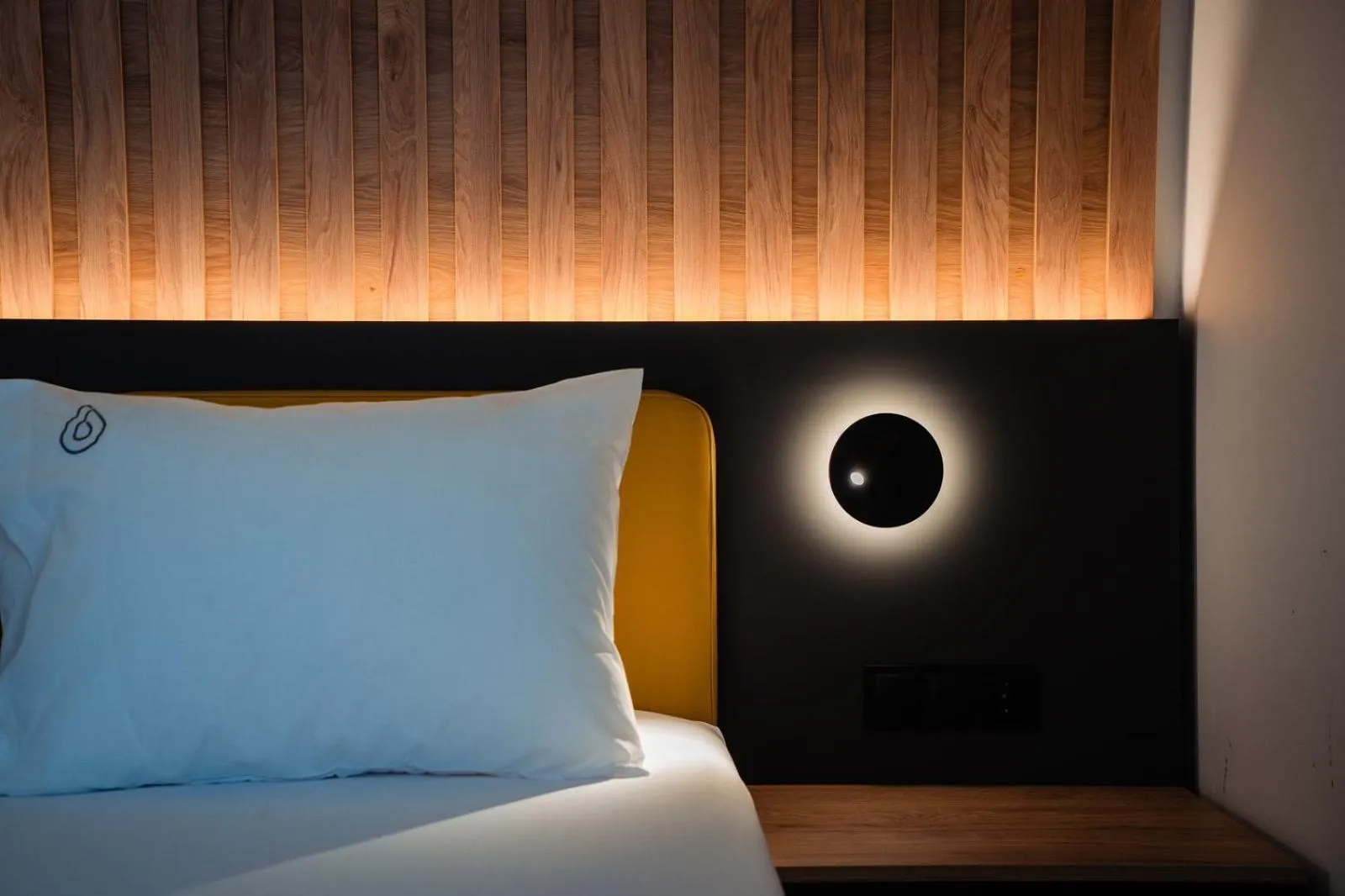 Bed in NERO SEASCAPE SUITES