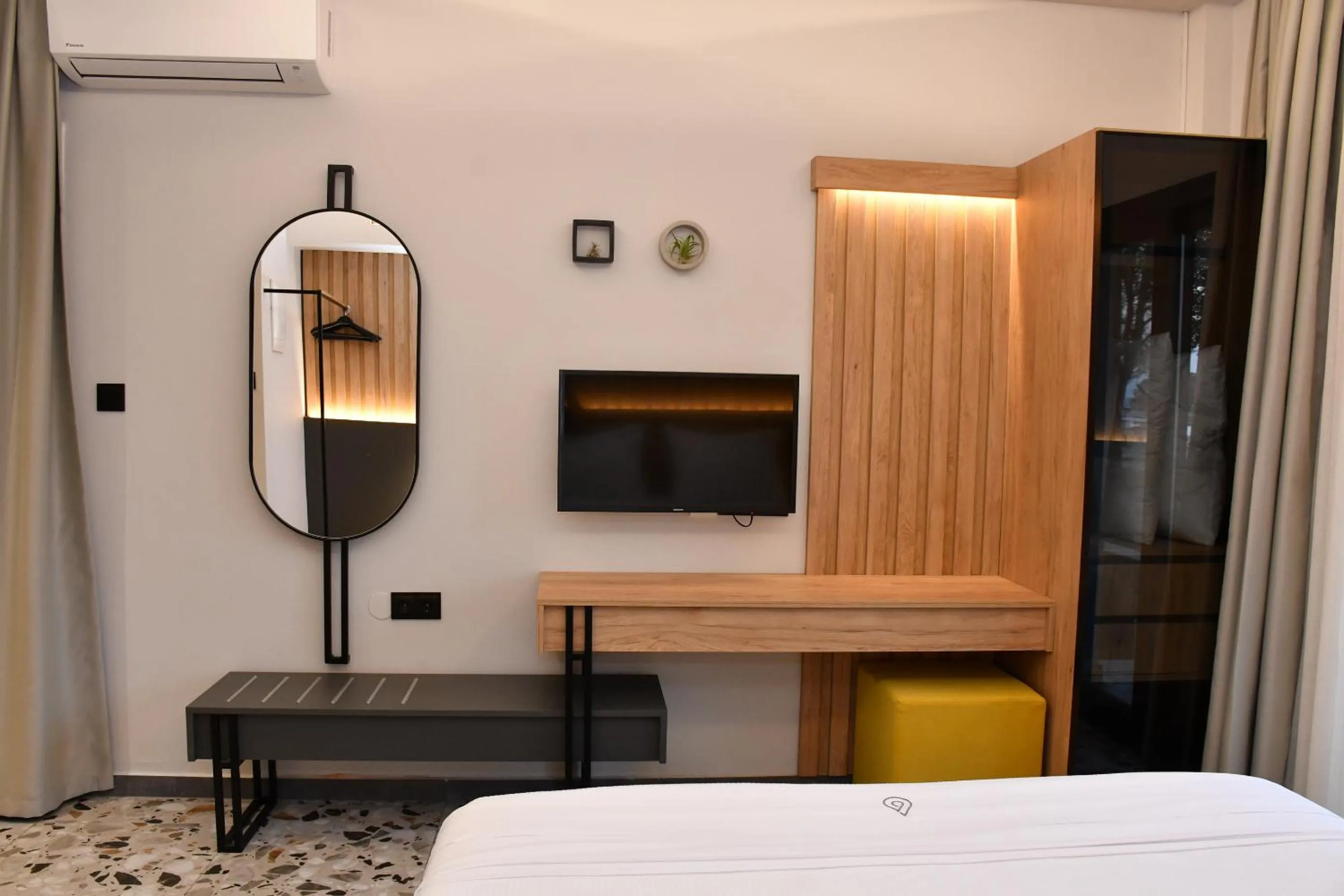 Bed in NERO SEASCAPE SUITES