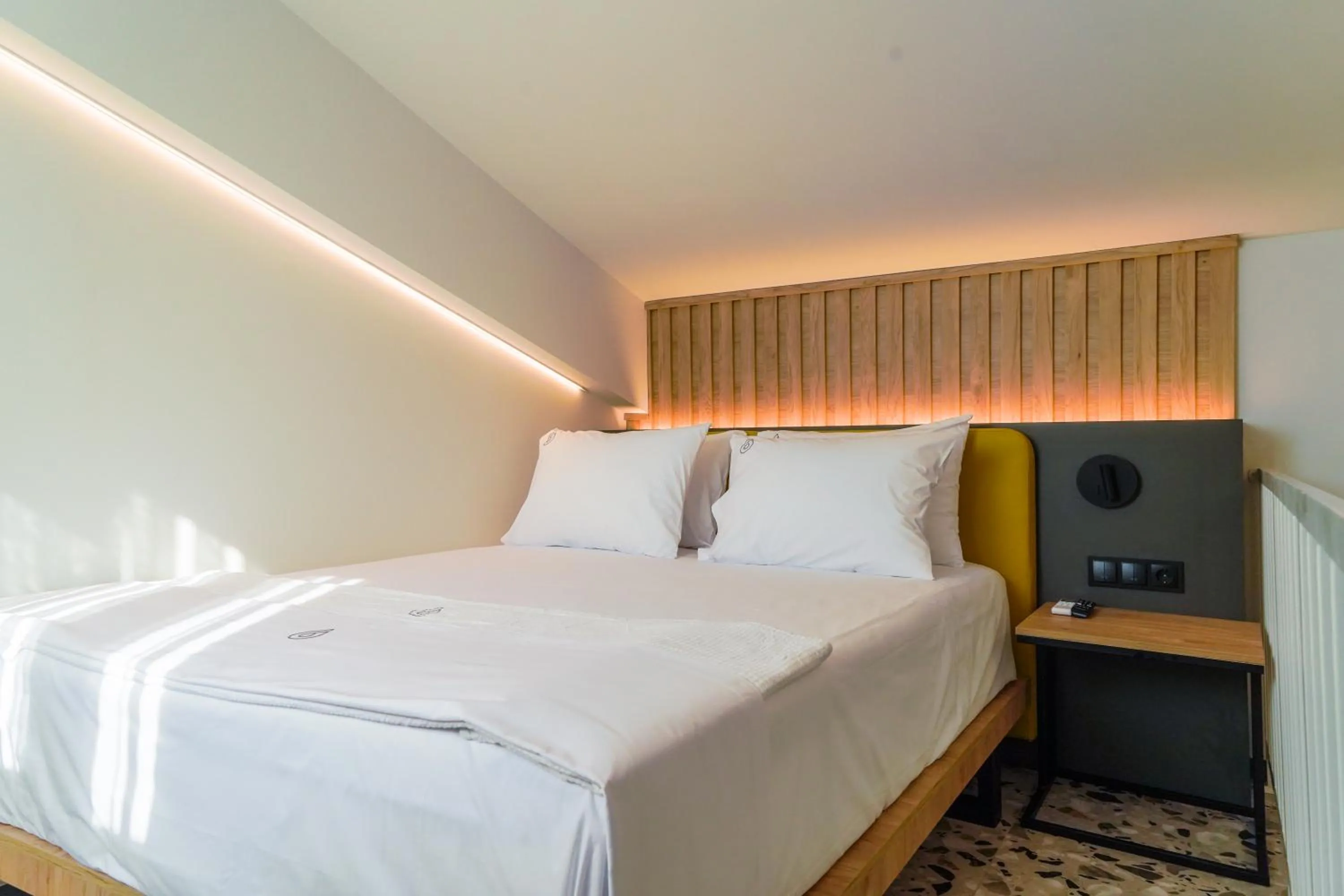 Photo of the whole room, Bed in NERO SEASCAPE SUITES