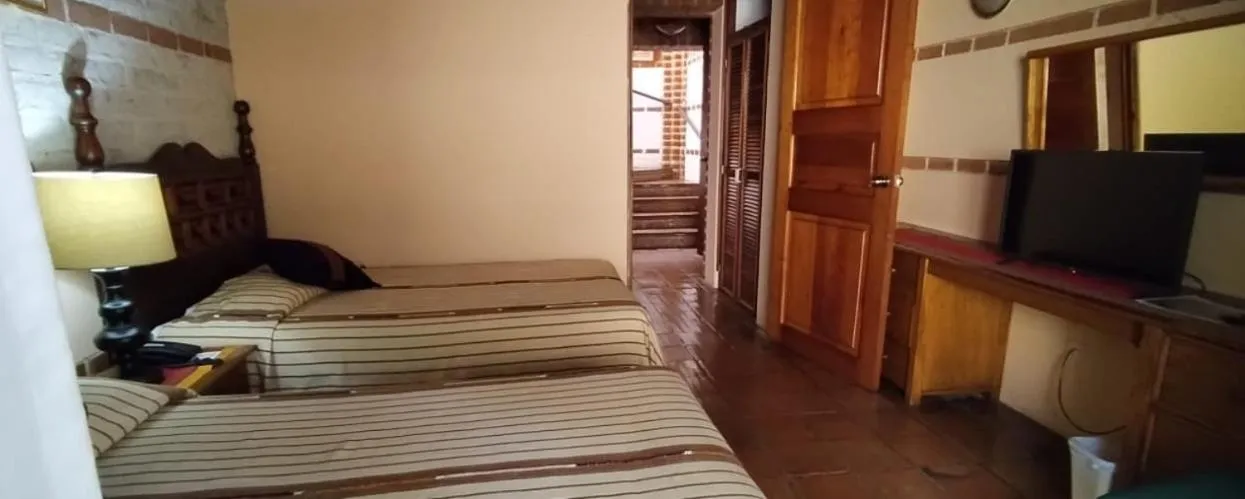 Bed in Hotel San Buenaventura de Atitlán