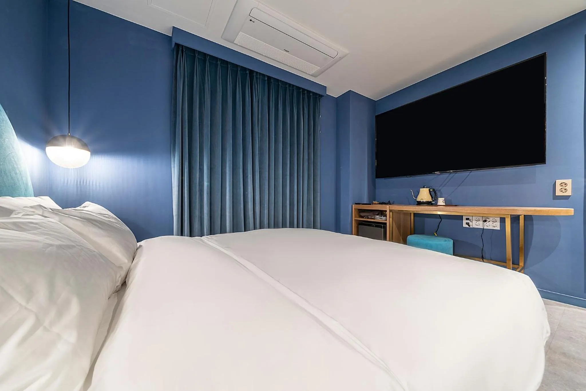 Bed in Wonju Hotel Ippda