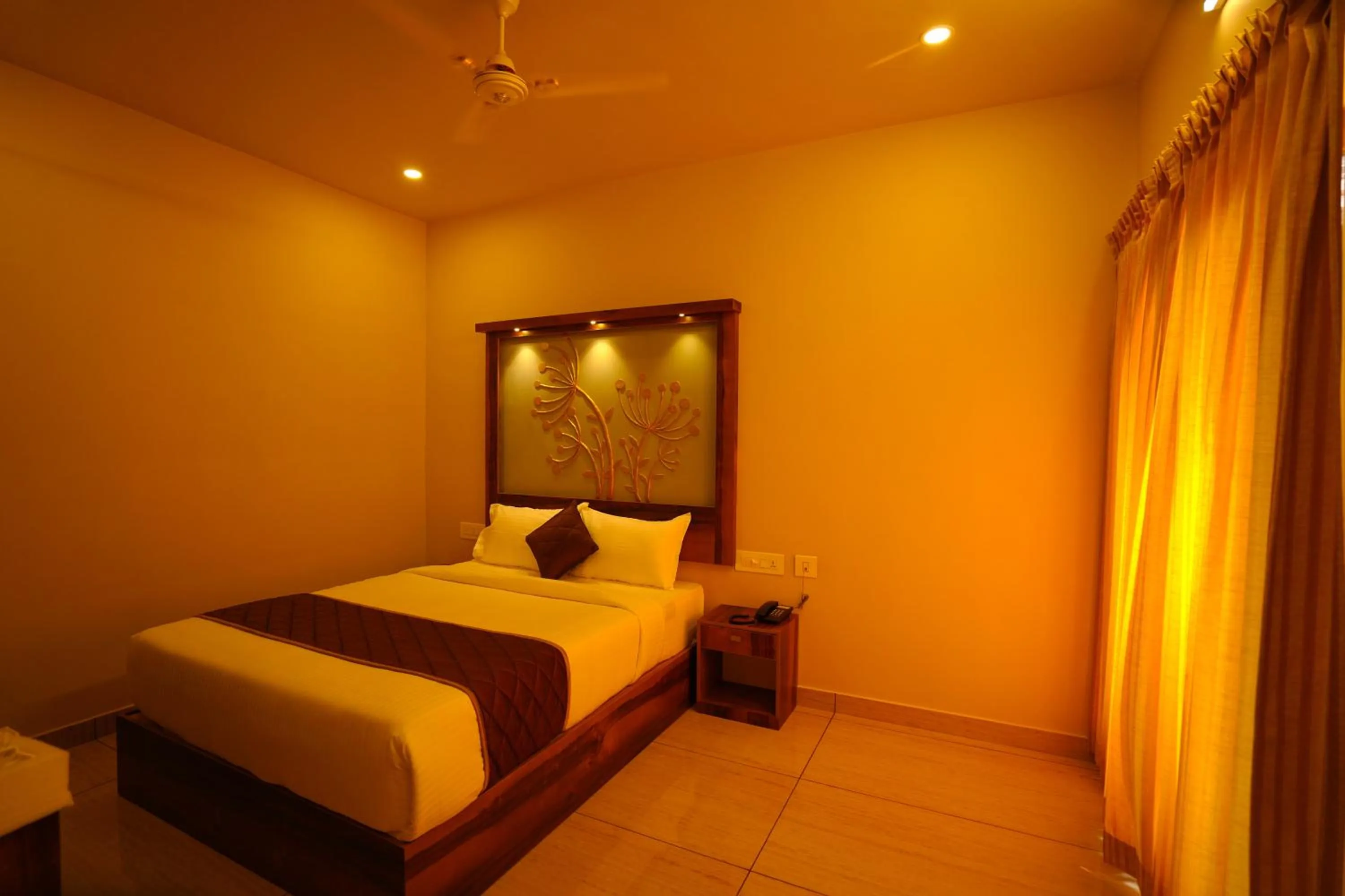 Bed in KOTTACKAL NATURE INN