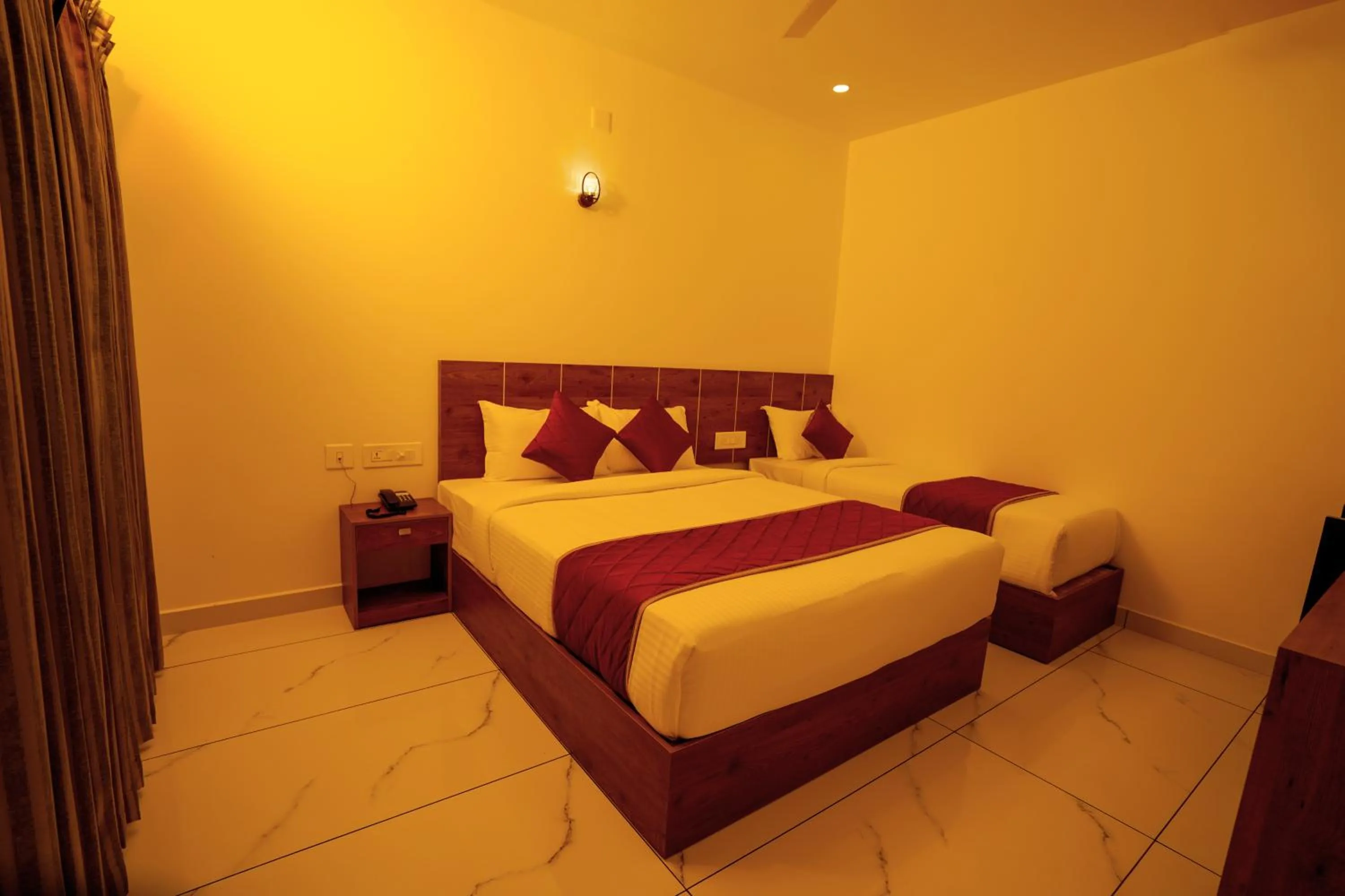 Bed in KOTTACKAL NATURE INN