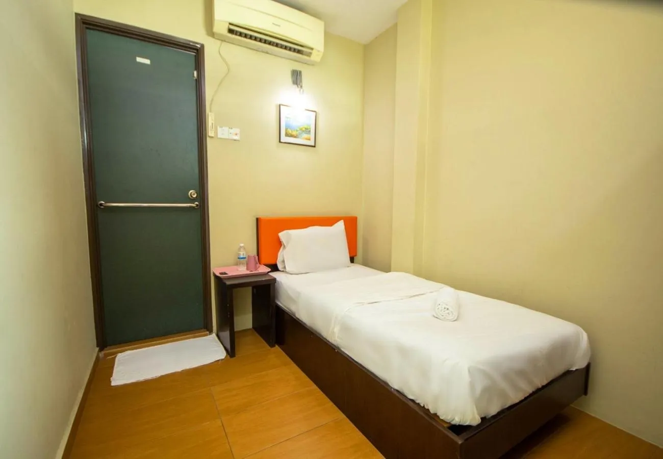 Bed in JQ Suria Hotel