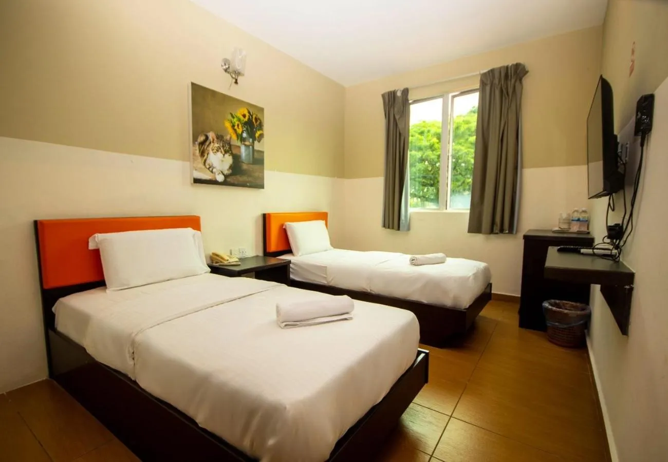 Bed in JQ Suria Hotel