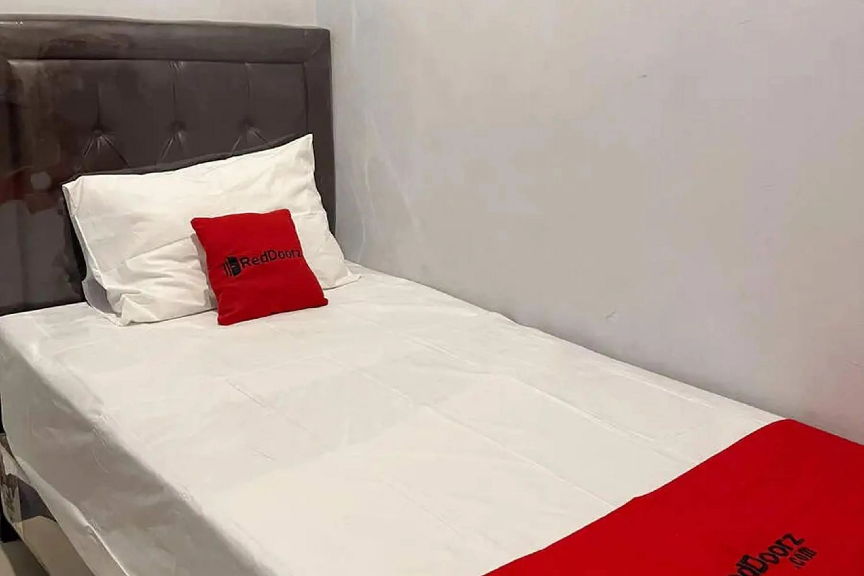 Bed in RedDoorz near Waterpark Citra Garden Medan