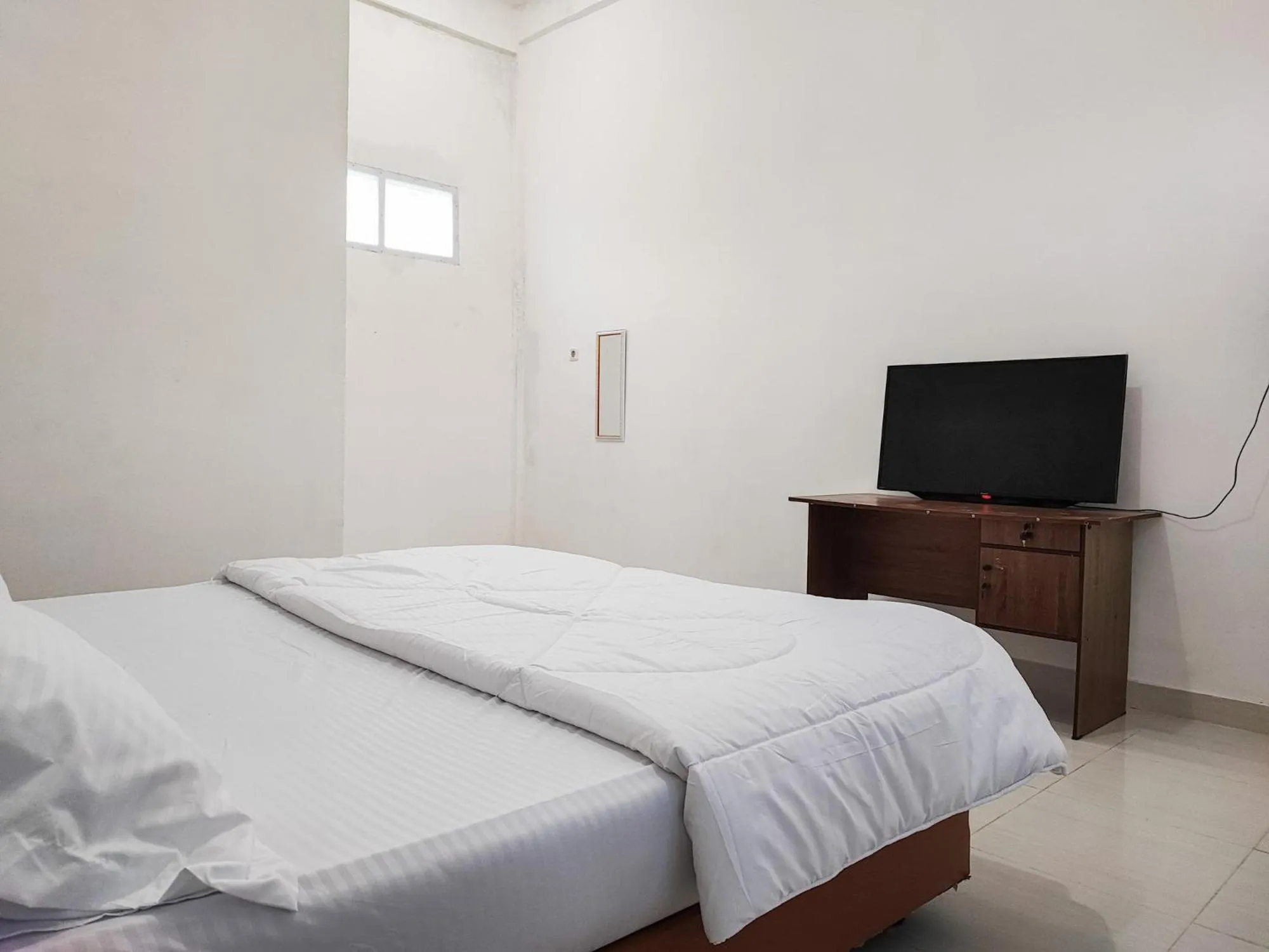 Bed in Adela Homestay Syariah Near Universitas Muhammadiyah Jambi Mitra RedDoorz