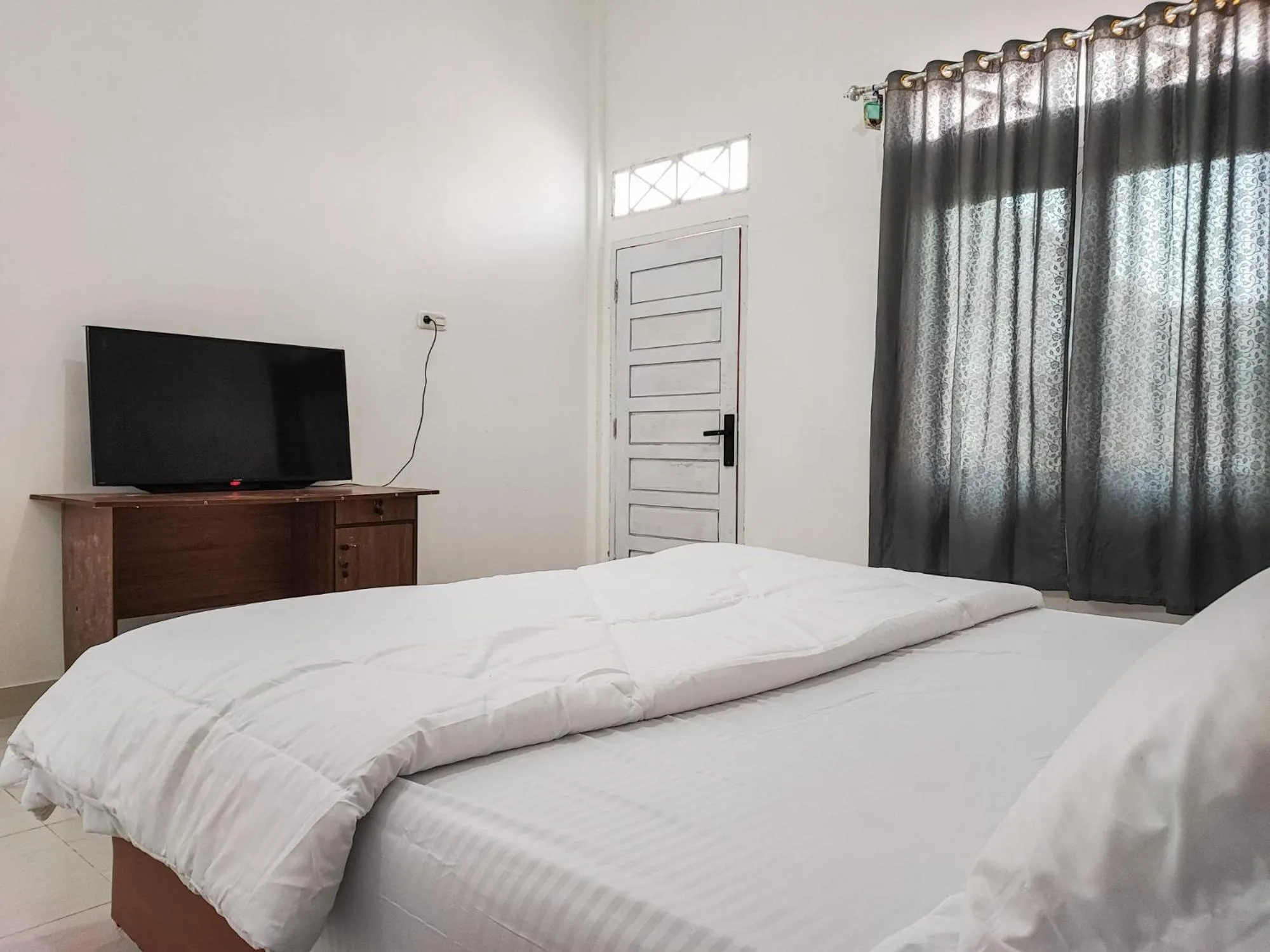 Bed in Adela Homestay Syariah Near Universitas Muhammadiyah Jambi Mitra RedDoorz