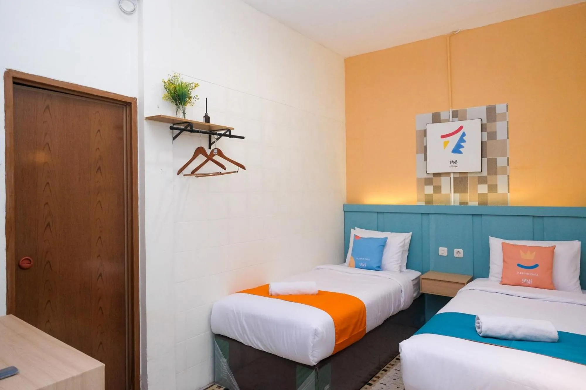 Bed in Sans Hotel City Inn Solo by RedDoorz