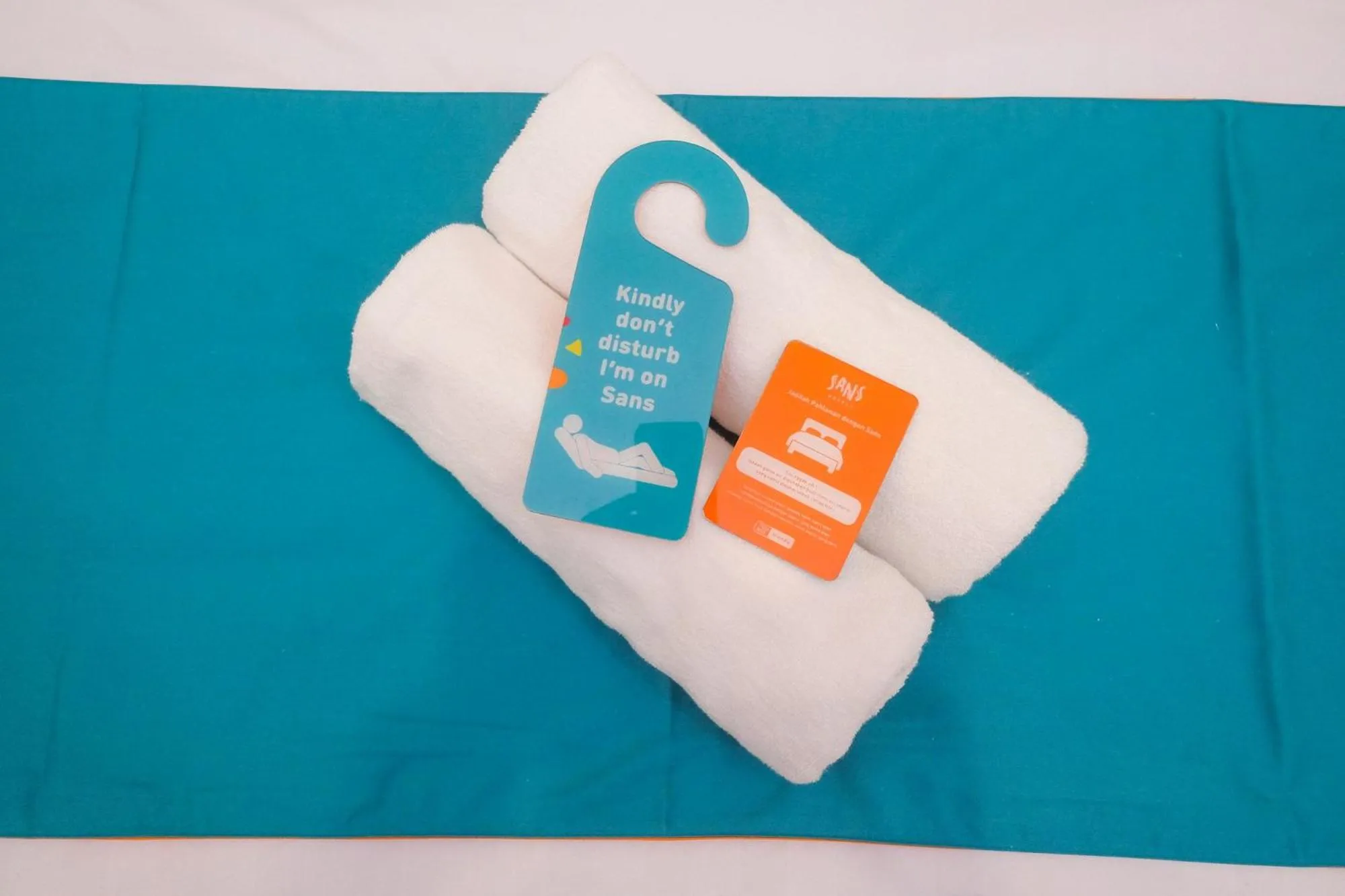 towels in Sans Hotel City Inn Solo by RedDoorz