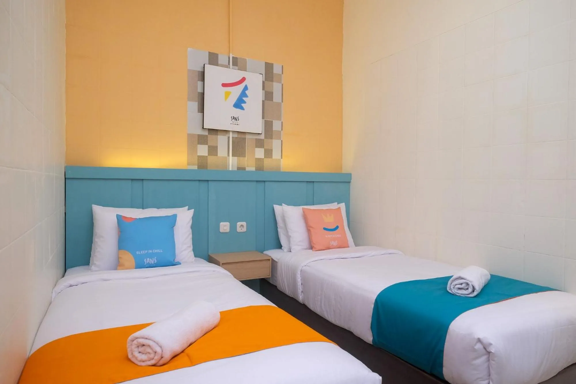 Bed in Sans Hotel City Inn Solo by RedDoorz