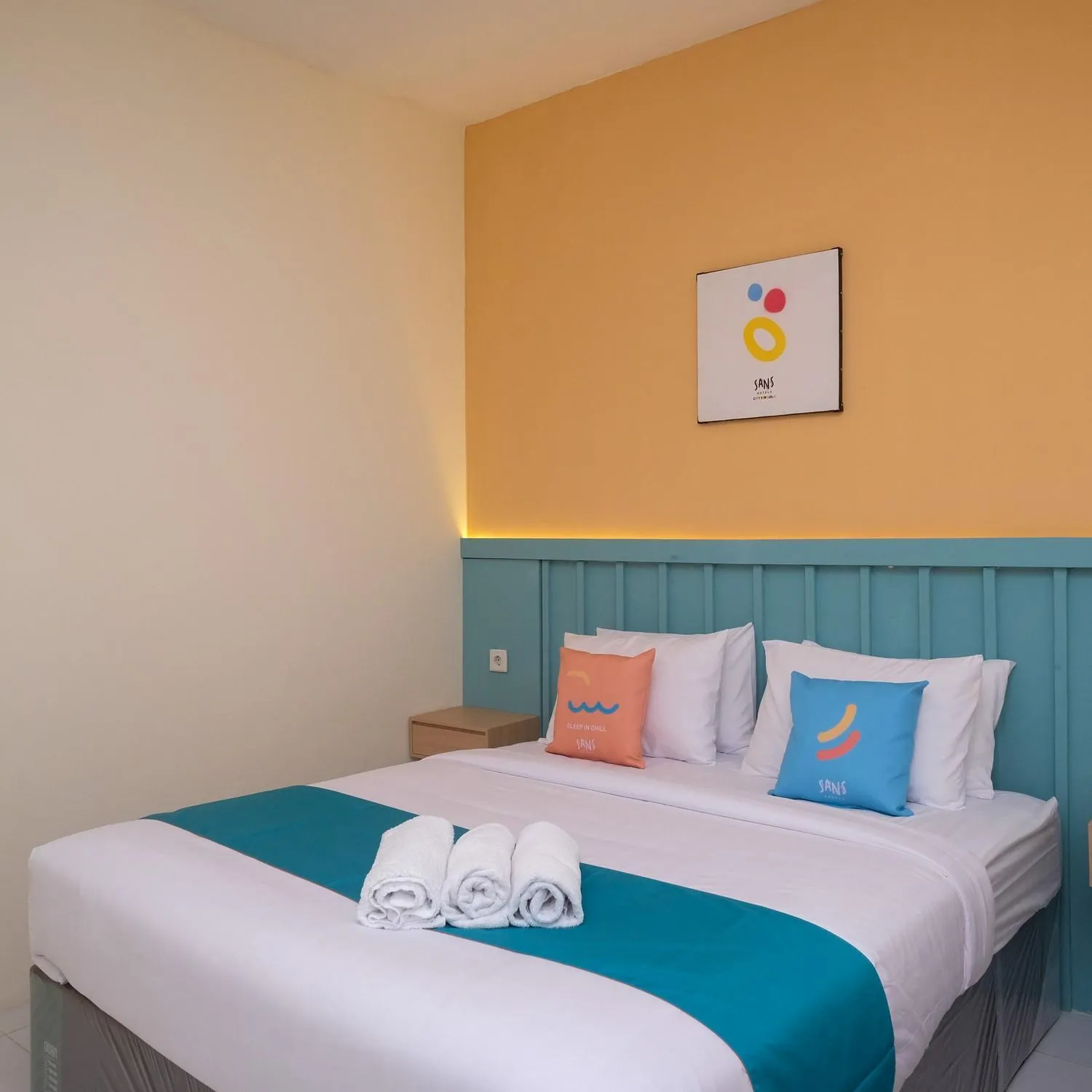 Bed in Sans Hotel City Inn Solo by RedDoorz