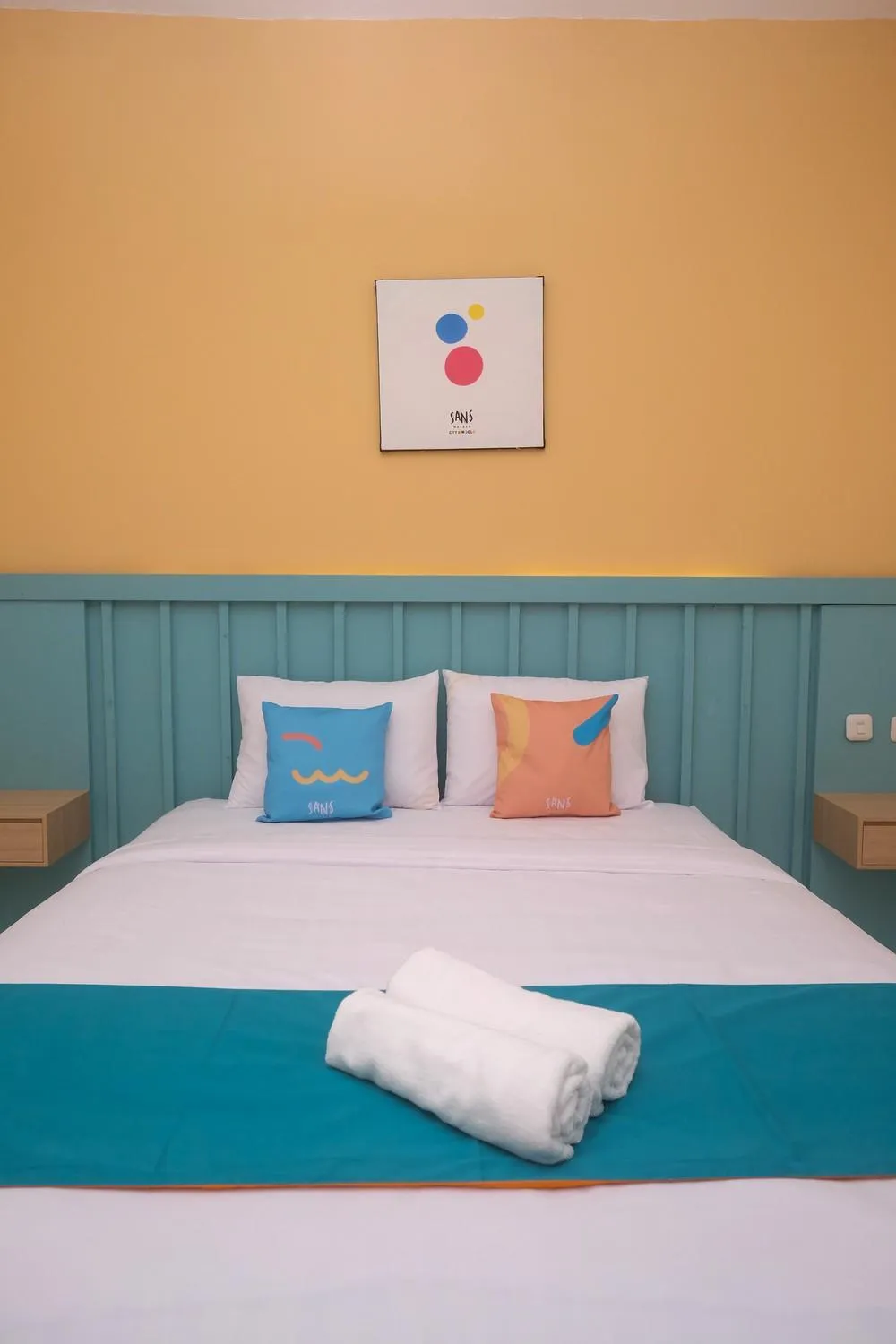 Bed in Sans Hotel City Inn Solo by RedDoorz