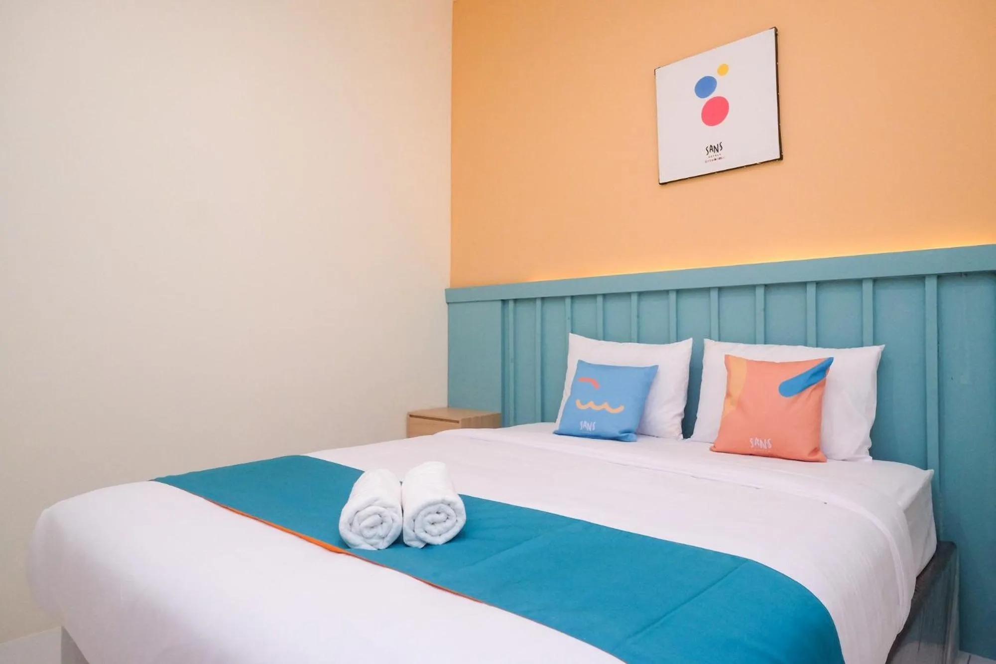 Bed in Sans Hotel City Inn Solo by RedDoorz