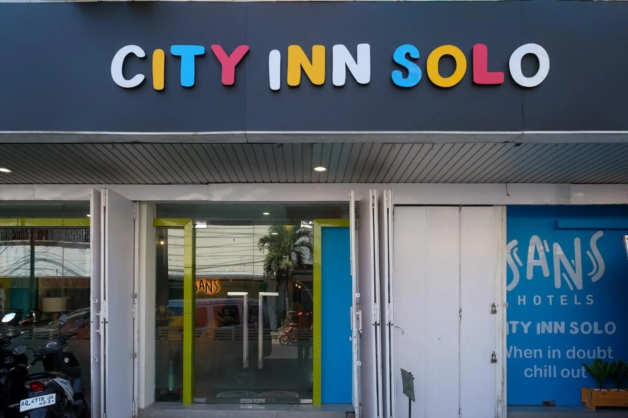 Property logo or sign in Sans Hotel City Inn Solo by RedDoorz