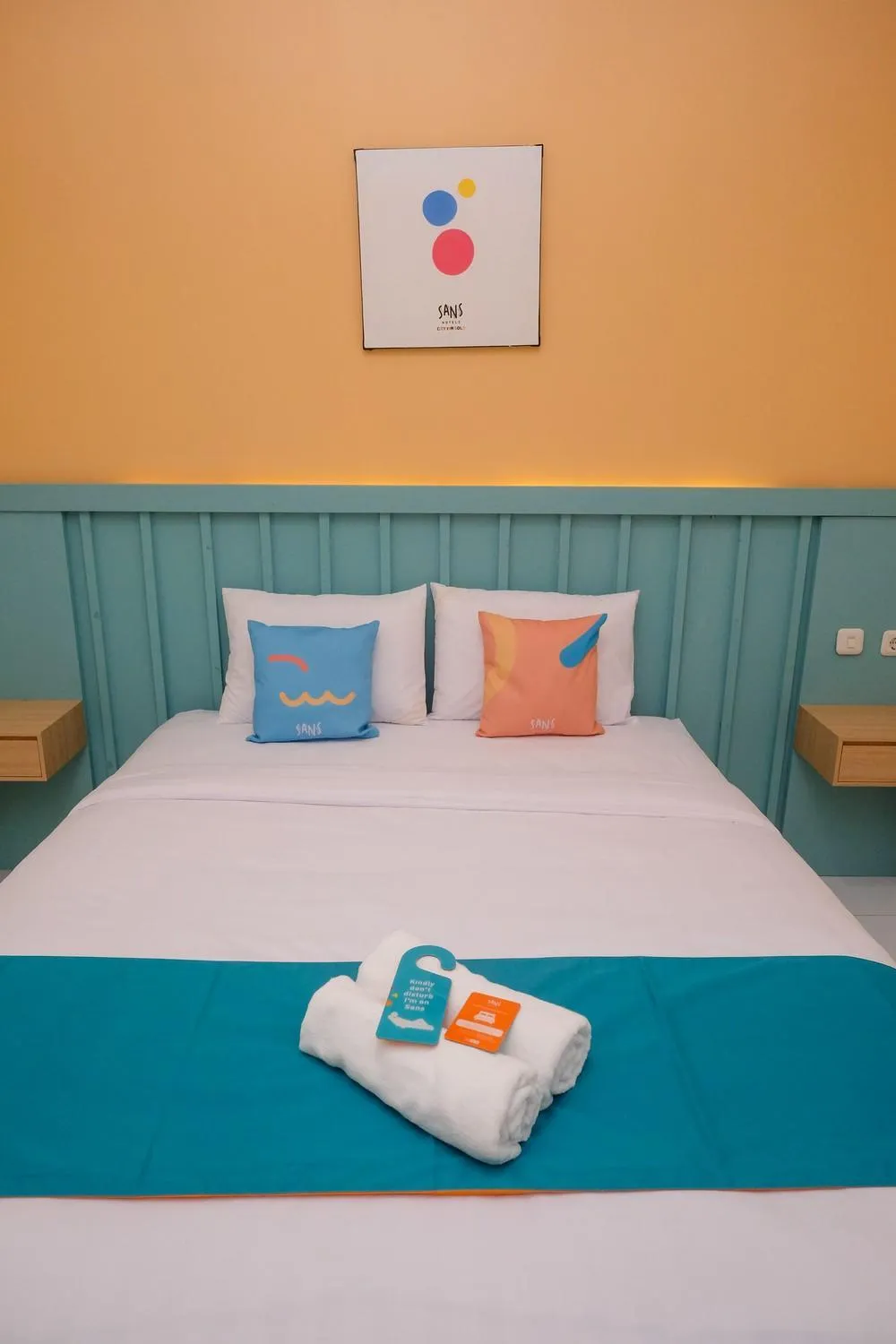 Bed in Sans Hotel City Inn Solo by RedDoorz