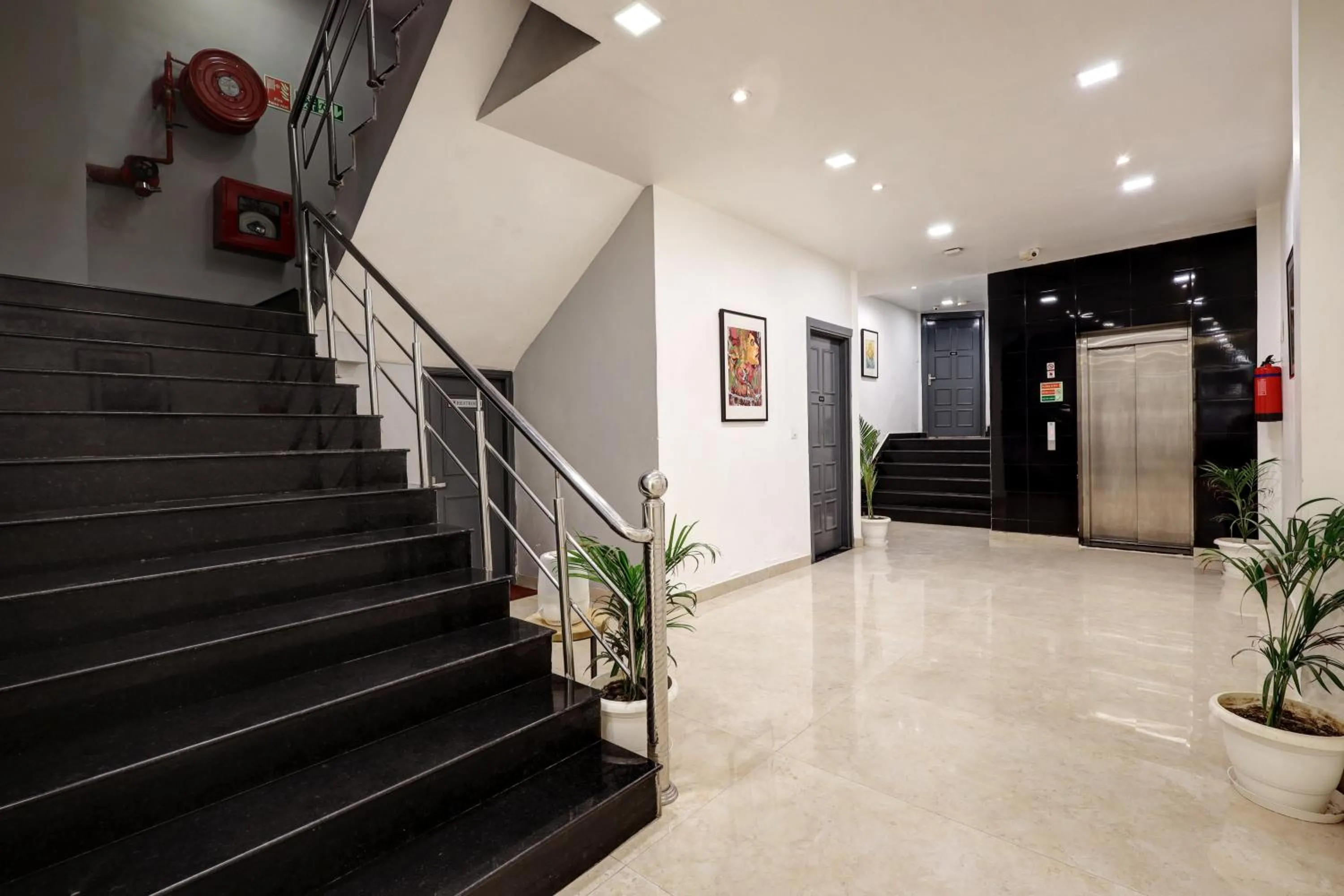 elevator in Hotel The Rasa Near Welcome Metro Station