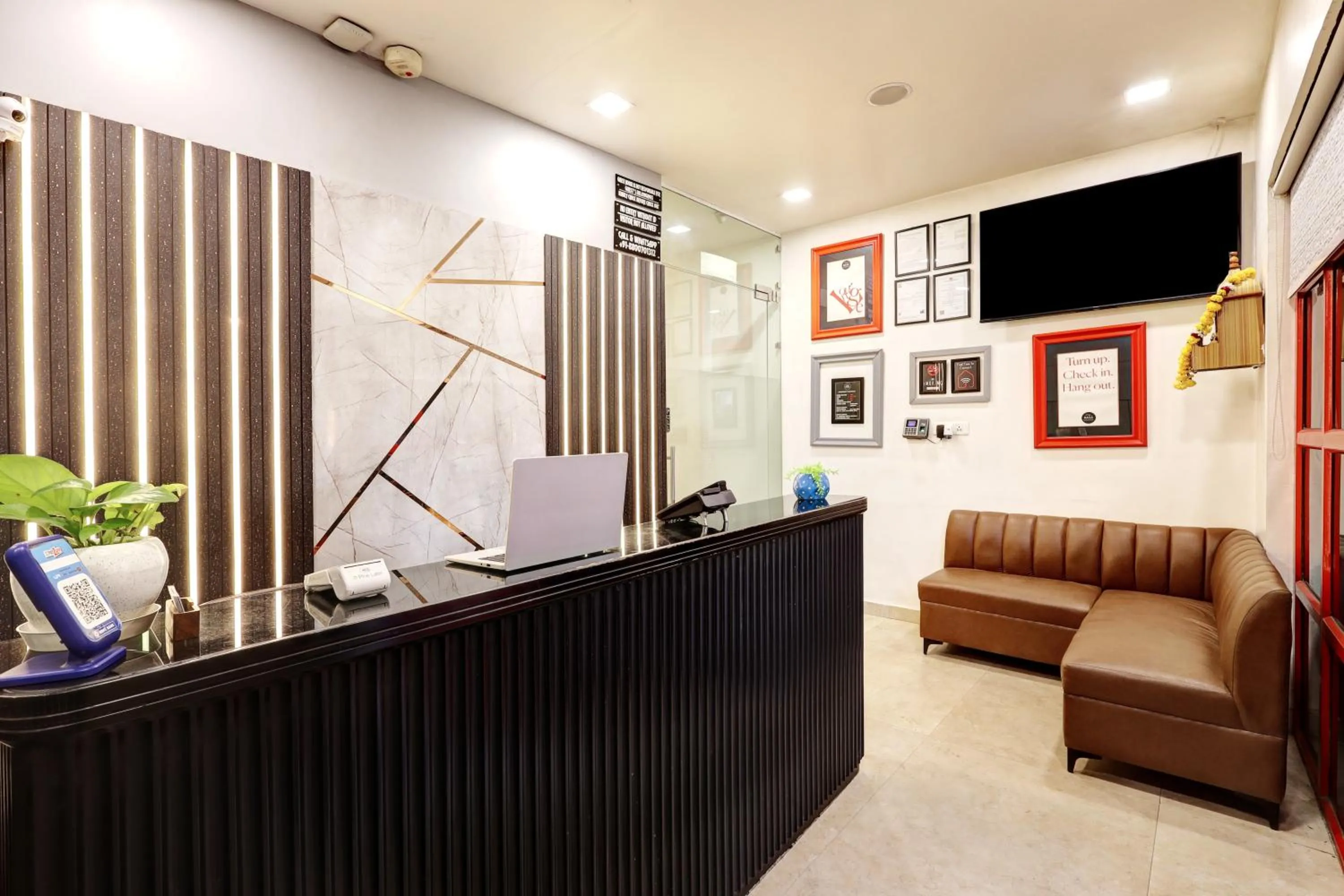 TV and multimedia in Hotel The Rasa Near Welcome Metro Station