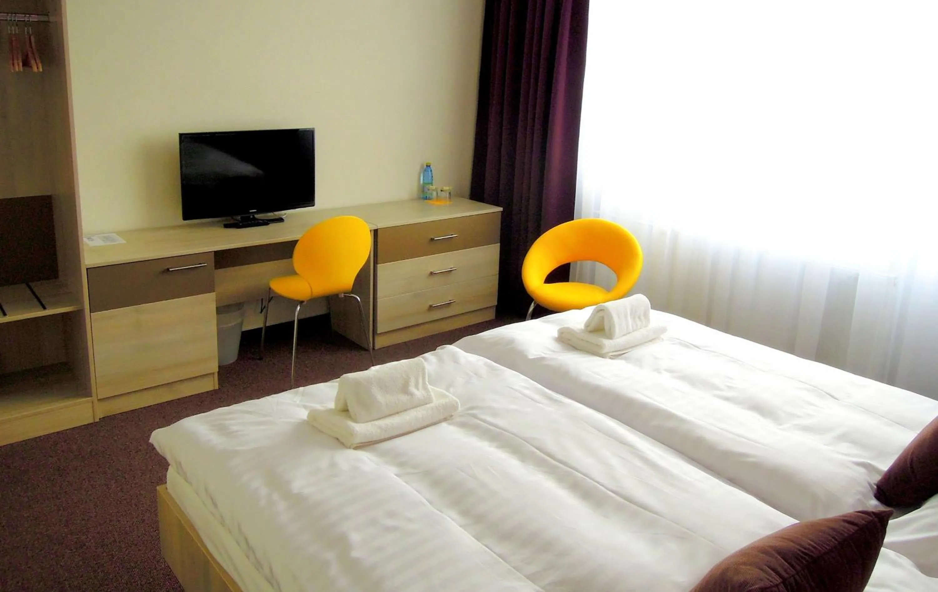 TV and multimedia, Bed in Hotel Kristína