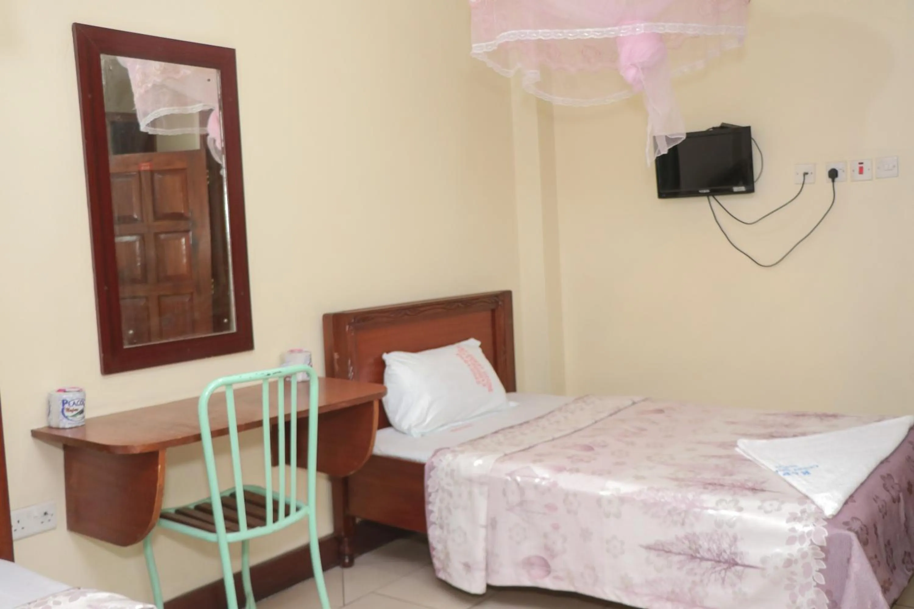 Bed in KAP Guest House