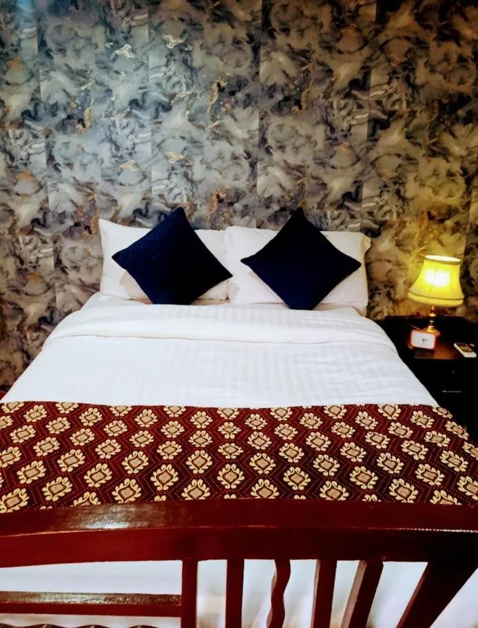 Bed in Chan Beach Resort & Hotel