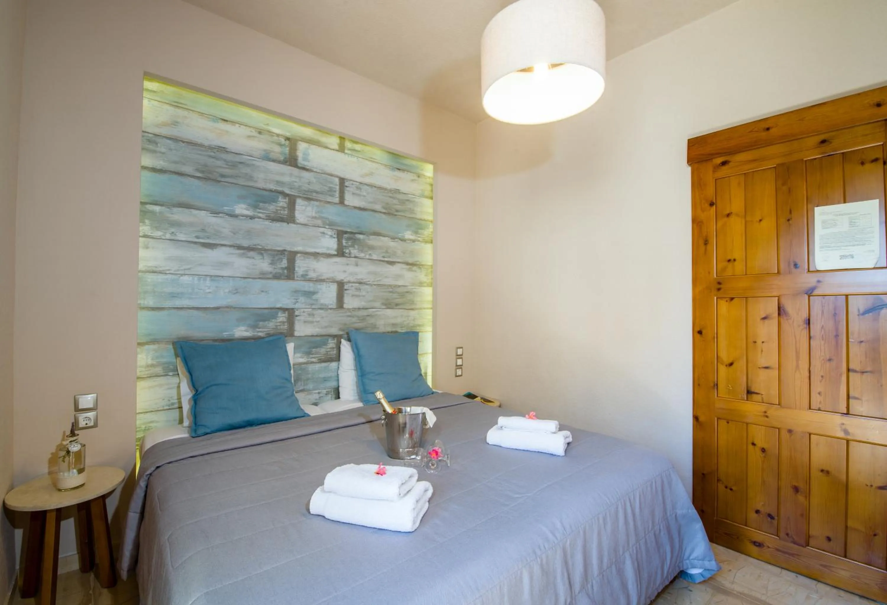 Bed in Evangelos Apartments