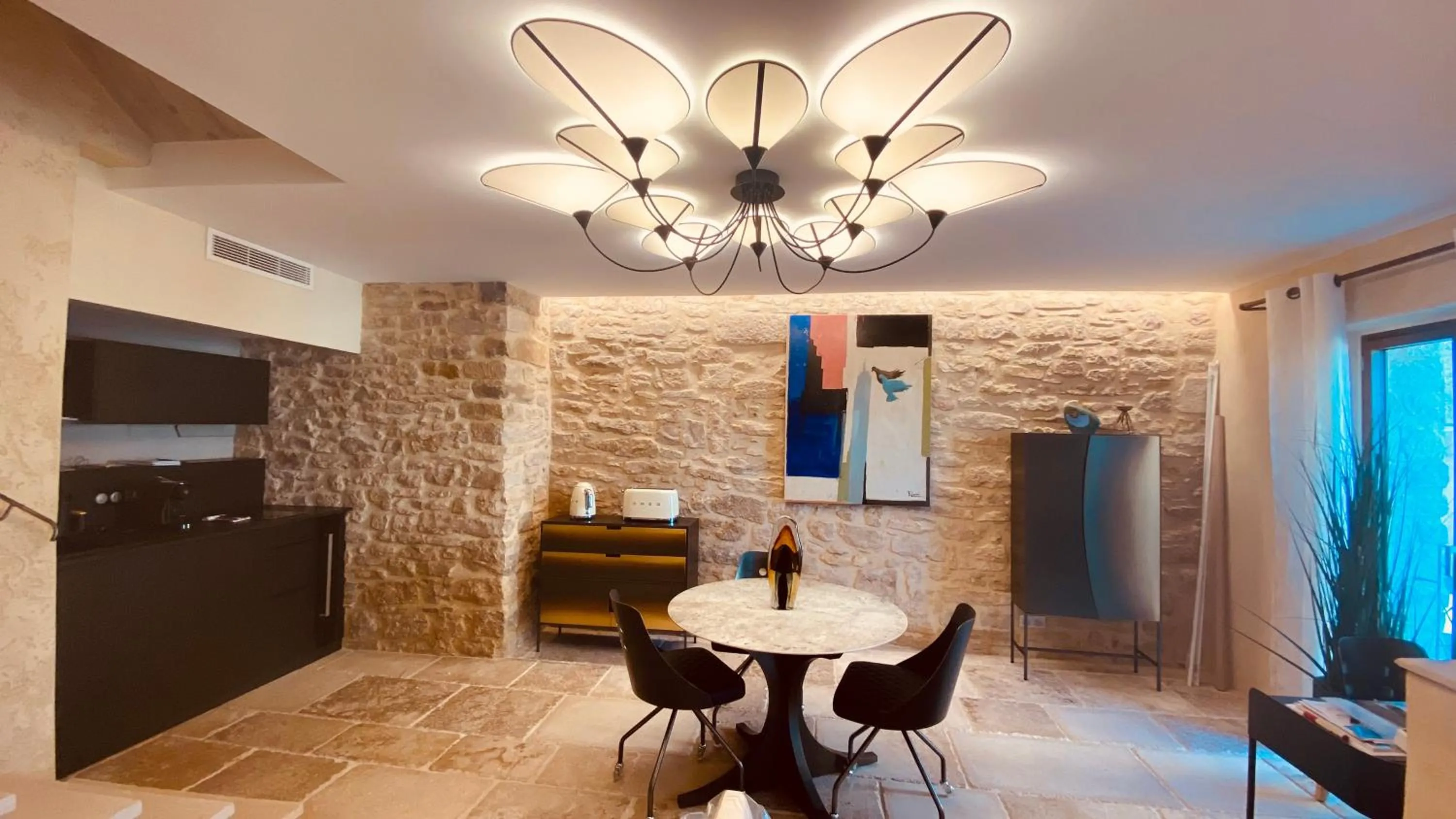 Living room in La Maison du Passage - Chambres - Suites premium, Spa, Piscine et Restaurant